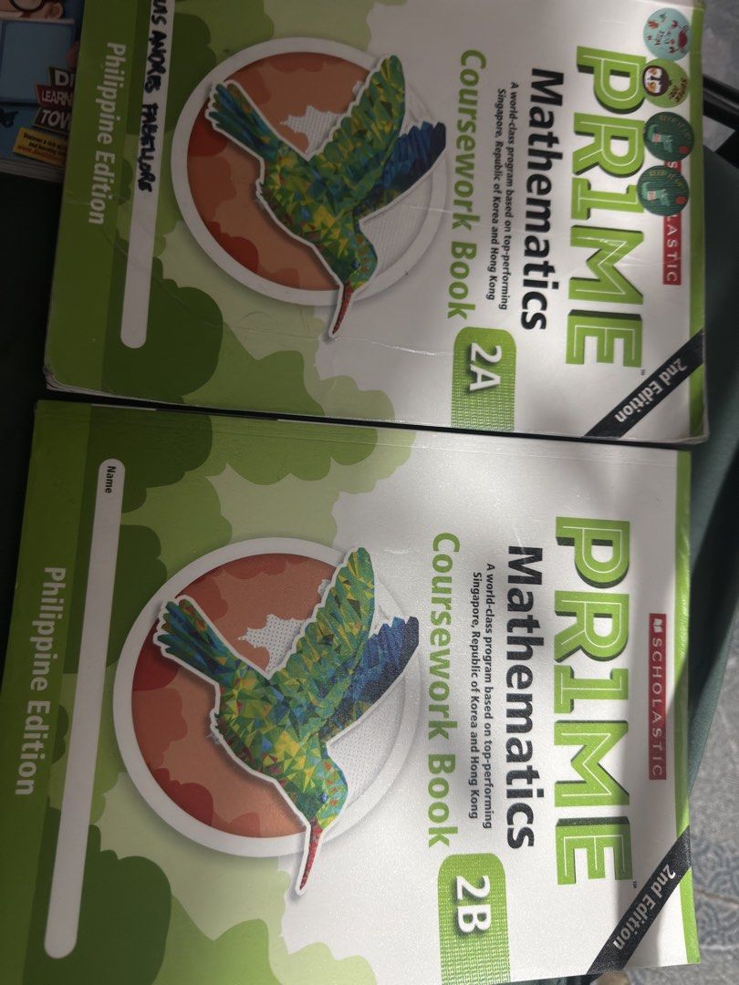 Scholastic PR1ME Mathematics Coursework Books 2A and 2B Philippine Edition (Category: Textbooks) located in Caloocan City. Submitted by mysticocean.46c204 (Listing ID 1465972768, Image 3). Description: - Scholastic PR1ME Mathematics Coursework Books (2nd Edition, Philippine Edition) - Includes Book 2A and Book 2B - Ideal for Grade 2 math practice and homeschooling - Book 2A: Name written on cover, a few stickers at the top left - Book 2B: Blank n