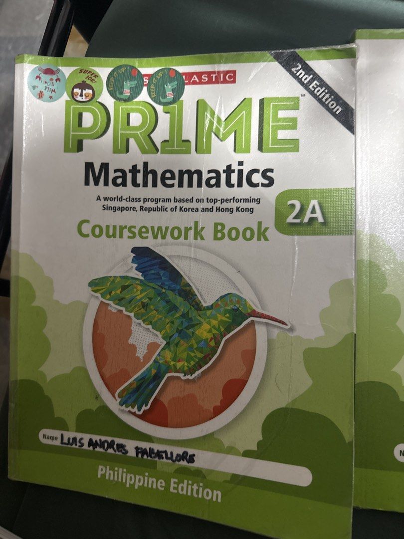 Scholastic PR1ME Mathematics Coursework Books 2A and 2B Philippine Edition (Category: Textbooks) located in Caloocan City. Submitted by mysticocean.46c204 (Listing ID 1465972768, Image 2). Description: - Scholastic PR1ME Mathematics Coursework Books (2nd Edition, Philippine Edition) - Includes Book 2A and Book 2B - Ideal for Grade 2 math practice and homeschooling - Book 2A: Name written on cover, a few stickers at the top left - Book 2B: Blank n