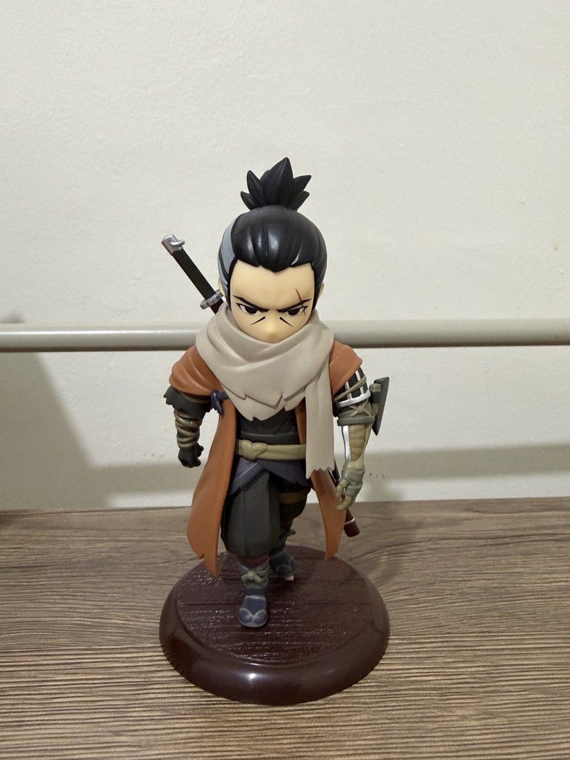 Sekiro Shadows Die Twice Figure (BIB) (Category: Figurines & Statues) located in Magalang. Submitted by xeevain (Listing ID 1466049806, Image 2). Description: - Brand: AcToys (Sekiro Shadows Die Twice Series) - Condition: BIB (Back in Box) / Pre-owned - Details: Chibi-style pre-painted figure mounted on a sturdy brown base - Flaw Note: One sword accessory is detached/broken (please check photos) - Packaging: Comes with original plastic blister an