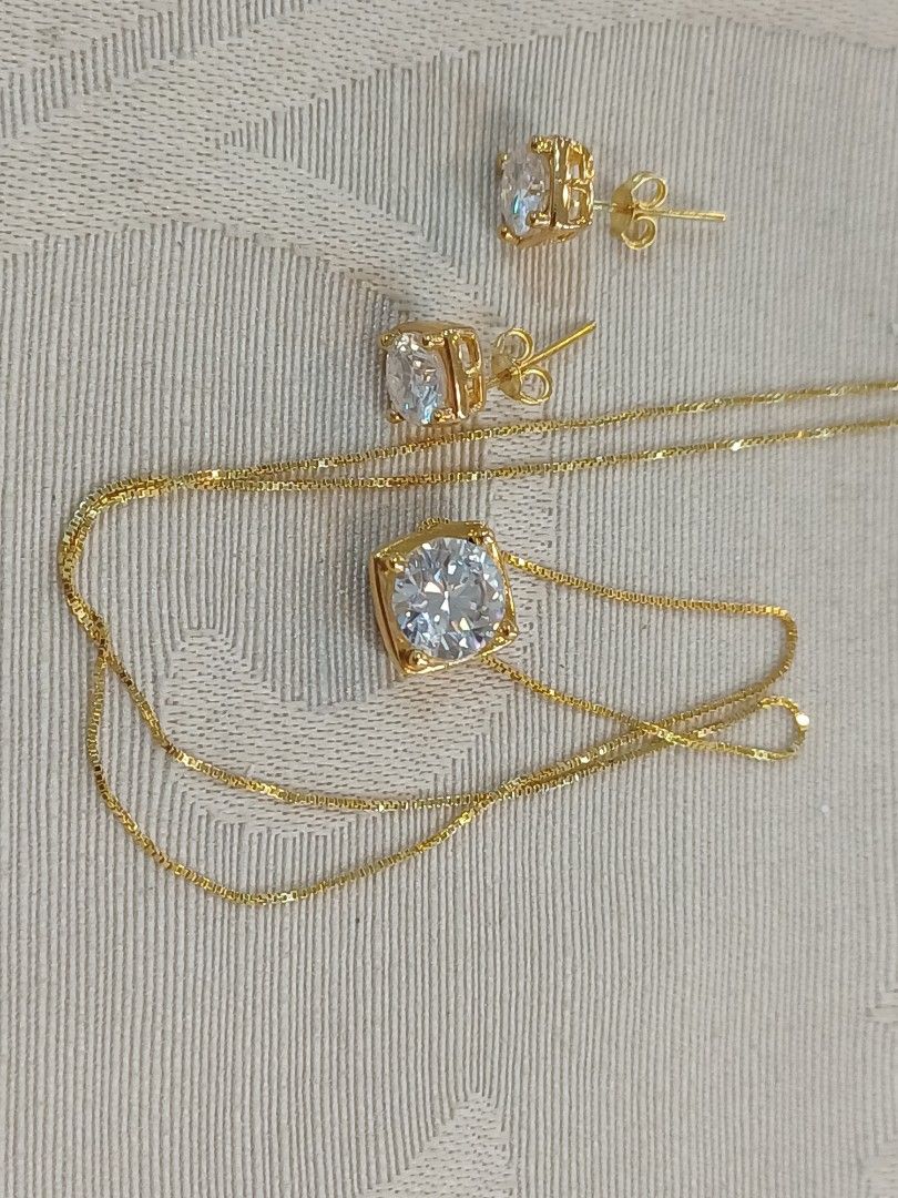 Set earring and ring (Category: Earrings) located in Makati City. Submitted by divinejewels.ph (Listing ID 1466040038, Image 3). Description: GFM-747 SET EARRING,NECKLACE PENDANT WHITE STONE 18KYG 1.7GRAMS 18' 7.7 6.7MM.