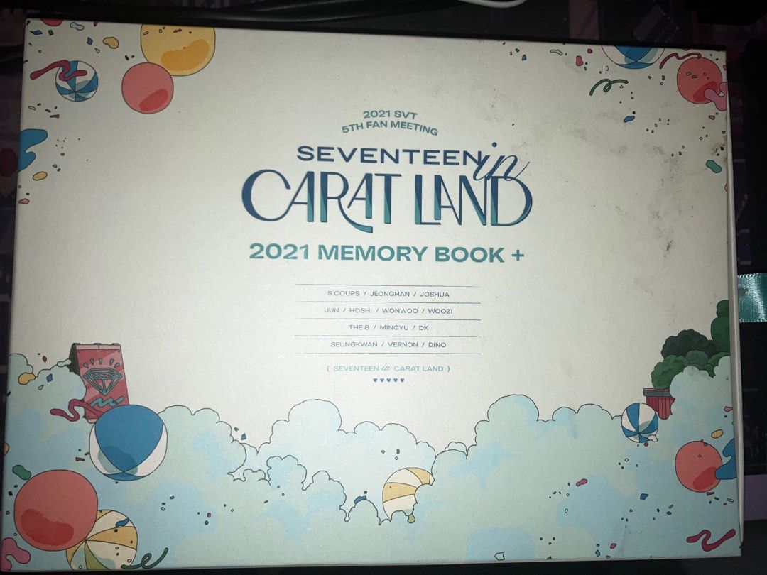 SEVENTEEN 2021 Carat Land Memory Book + (Category: K-Wave Merchandise) located in Manila. Submitted by yilviolet (Listing ID 1465956629, Image 1). Description: - Official SEVENTEEN 2021 Carat Land 5th Fan Meeting memory book set - Inclusions: Outer box, group photo print, envelope, and booklet UNSEALED WITH COMPLETE INCLUSIONS.
