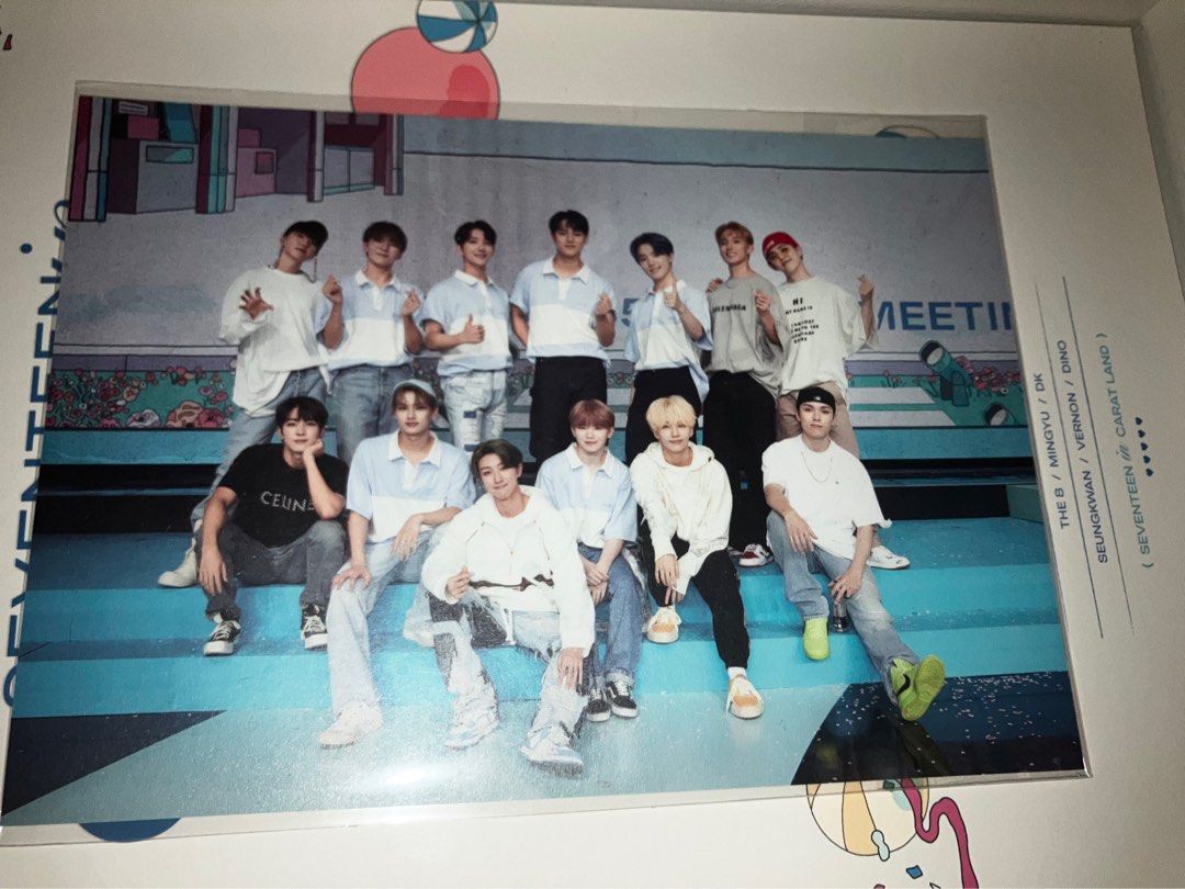 SEVENTEEN 2021 Carat Land Memory Book + (Category: K-Wave Merchandise) located in Manila. Submitted by yilviolet (Listing ID 1465956629, Image 2). Description: - Official SEVENTEEN 2021 Carat Land 5th Fan Meeting memory book set - Inclusions: Outer box, group photo print, envelope, and booklet UNSEALED WITH COMPLETE INCLUSIONS.