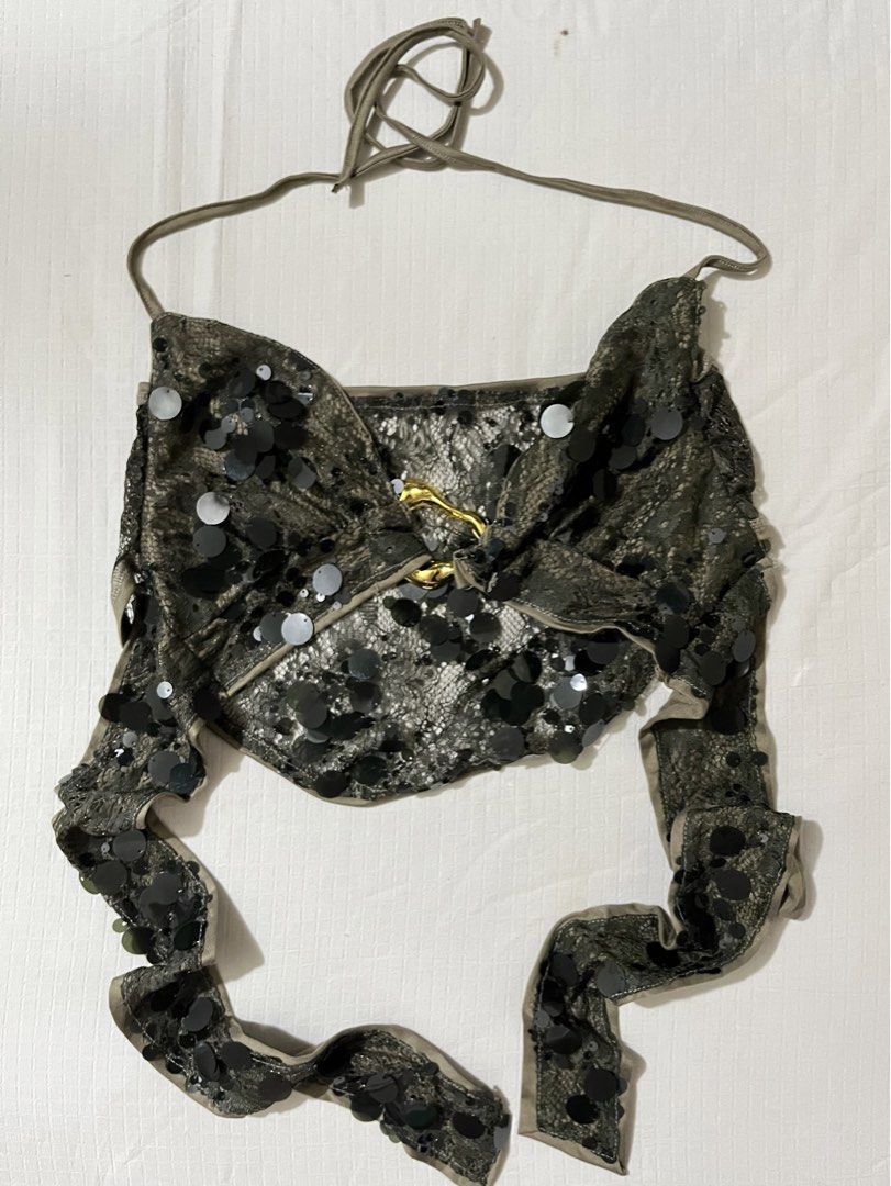 SHEIN Green Sequin Halter Crop Top Size S (Category: Sleeveless) located in Quezon City. Submitted by getitrightaway.ph (Listing ID 1466043773, Image 1). Description: - Brand: Shein - Size: S - Color/Style: Olive green halter crop top with shiny black sequins and lace overlay - Features: Open back, secure halter ties, and trendy gold hardware ring connector - Condition: Brand new, only tried on, tag still attached - Perfect for: Nights out, parti