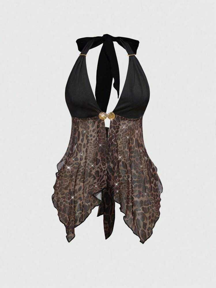 Shein Leopard Print Mesh Halter Top with Shell Buckle (Category: Sleeveless) located in Quezon City. Submitted by getitrightaway.ph (Listing ID 1466070251, Image 1). Description: - Brand: Shein - Design: Solid black upper with leopard print sheer mesh lower section - Details: Sparkly rhinestones scattered on mesh & gold-tone shell-shaped front buckle - Closure: Halter neck tie and adjustable back tie - Hemline: Asymmetrical handkerchief hem - Mat