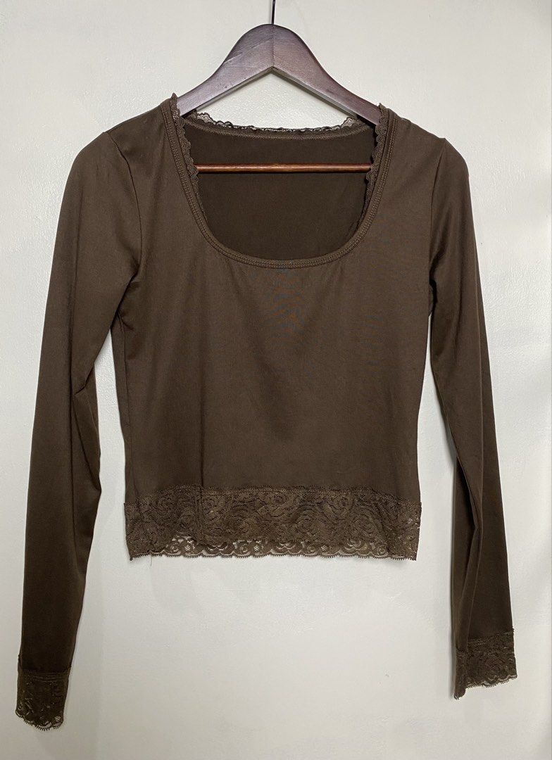 Shein long sleeve crop top (Category: Others Tops) located in Makati City. Submitted by indaysukaycloset (Listing ID 1466024656, Image 1). Description: SHEIN LACE TRIM LONG SLEEVE CROP TOP Brand: SHEIN Size: M on tag - Fits S-M Color: Choco Brown / Coffee Brown Details: - Style: Scoop neckline, long sleeve, cropped fit - Accent: Lace trim on neckline, hem, and cuffs - elegant - Material: 95% Polyester 5% Elastane - stretchy, soft, body-hugging - 