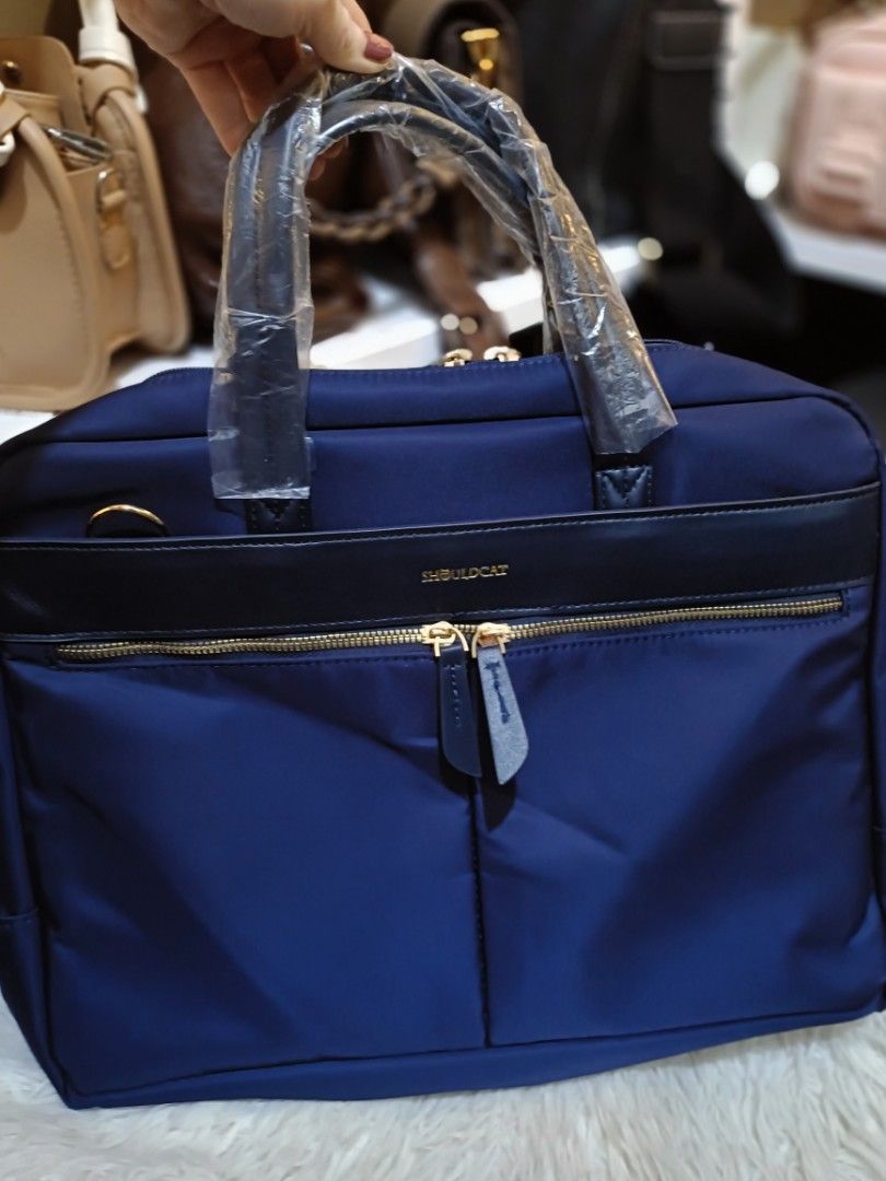 Shouldcat laptop bag hand bag with RFID (Category: Laptop Bags & Sleeves) located in Bocaue. Submitted by bags.and.beyond (Listing ID 1466100433, Image 2). Description: ✨Missing long strap ✨up to 14" laptop.