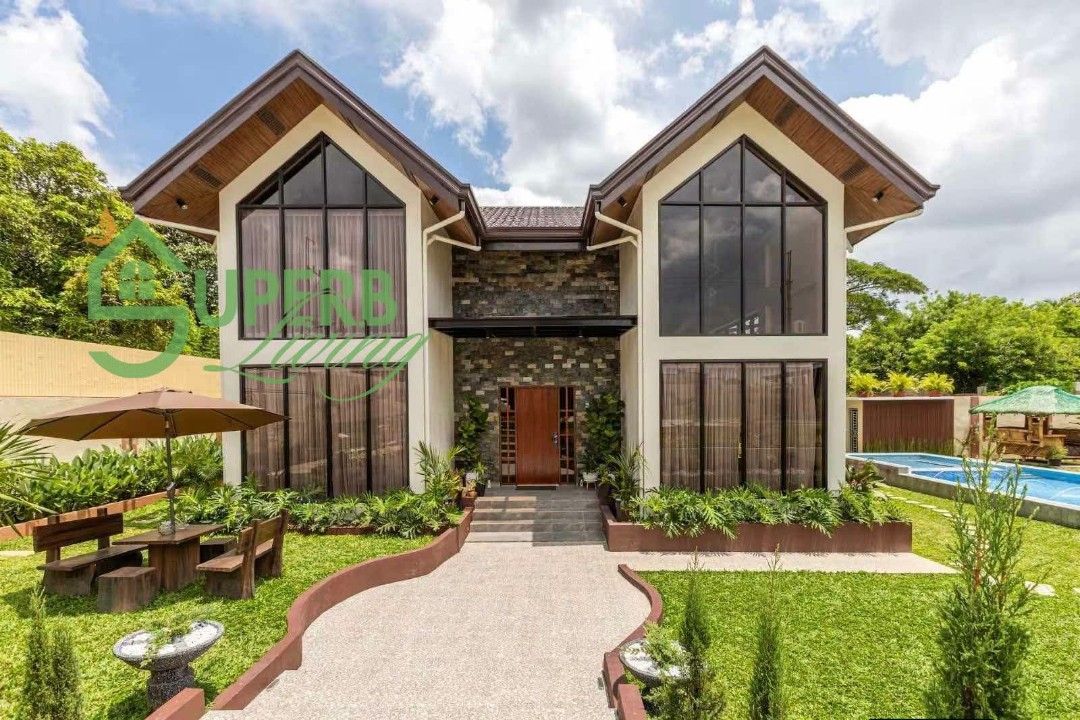 SILANG LUXURIOUS VILLA WITH SWIMMING POOL (Category: House & Lot) located in Quezon City. Submitted by superbliving (Listing ID 1466121221, Image 1). Description: ✨ OPERATIONAL PRIVATE RESORT | INCOME-GENERATING AIRBNB 𝐁𝐫𝐚𝐧𝐝-𝐍𝐞𝐰 𝐌𝐨𝐝𝐞𝐫𝐧 𝐒𝐜𝐚𝐧𝐝𝐢𝐧𝐚𝐯𝐢𝐚𝐧-𝐈𝐧𝐬𝐩𝐢𝐫𝐞𝐝 𝐇𝐨𝐦𝐞 𝐢𝐧 𝐒𝐢𝐥𝐚𝐧𝐠, 𝐂𝐚𝐯𝐢𝐭𝐞 A stunning fully furnished private resort-style property on a spacious 1,450 sqm lot, currently operating as an incom