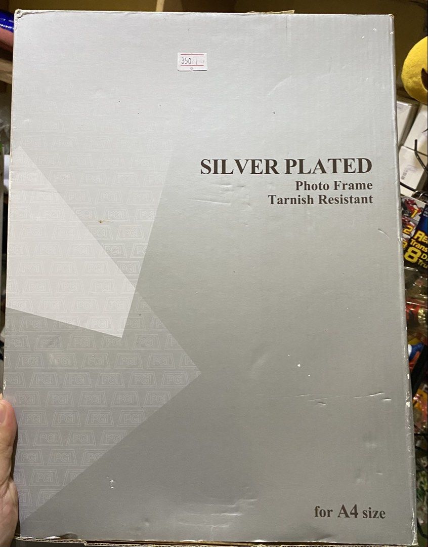 Silver Plated A4 Photo Frame Tarnish Resistant (Category: Frames & Pictures) located in Baguio. Submitted by thrift_bonita (Listing ID 1466048640, Image 2). Description: - Size: Fits A4 documents or pictures - Finish: Silver plated with tarnish-resistant coating and polished border - Backing: Premium black velvet with built-in stand - Display: Can be hung or placed vertically or horizontally - Condition: Brand new with original box included.