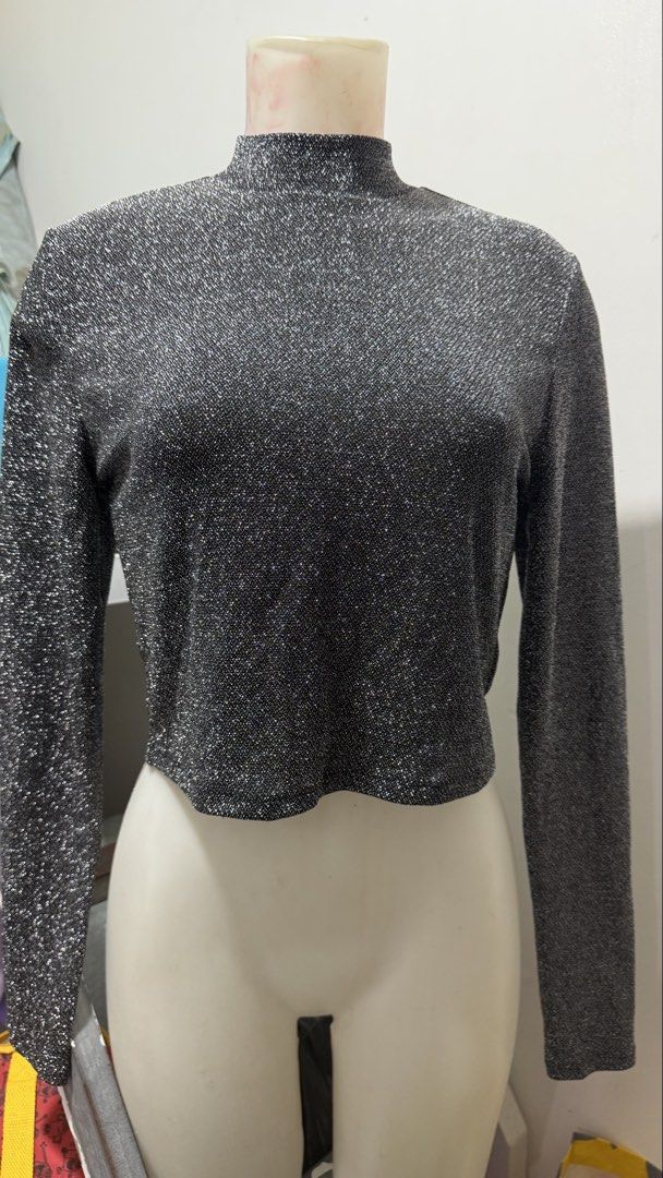 Silver Sparkle Mock Neck Crop Top (Category: Sleeveless) located in Taguig. Submitted by markaisie (Listing ID 1466053543, Image 1). Description: 1. H&M Divided glittered croptop Large with Tag 300 2 Forever 21 Floral Dress Medium 300 3 Zara Floral Red Dress Large 300 4 Zanea bodysuit with tag 100 5 Blue Garteredtop Dress 150 6 Brown Dress 150 7 ArmyGreen Printed Dress 150 8 Purple Eyelet Blouse 150 9 Workout pants and 1 short (very nice in actua