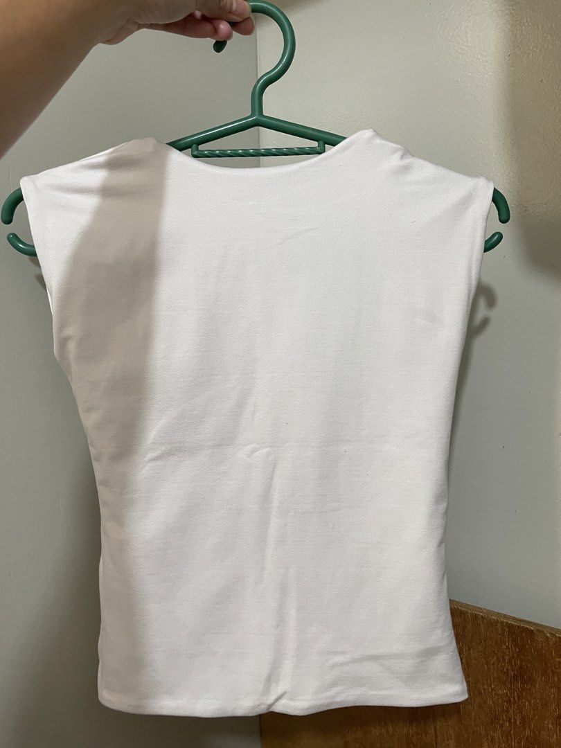size small white fhilar backless top (Category: Shirts) located in Quezon City. Submitted by leocurations (Listing ID 1465975222, Image 1). Description: .