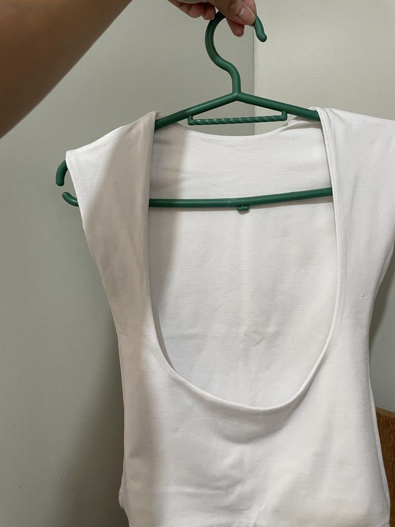 size small white fhilar backless top (Category: Shirts) located in Quezon City. Submitted by leocurations (Listing ID 1465975222, Image 2). Description: .