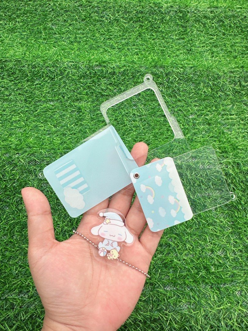 Sleeping Cinnamoroll Sanrio Acrylic Keychain (Category: Character Goods) located in Manila. Submitted by ronoarabbit.ph (Listing ID 1466047851, Image 3). Description: - Character: Sleeping Cinnamoroll (Sanrio) - Design: Cute layered acrylic keychain featuring blue clouds, rainbow, and a small companion - Material: High-quality transparent acrylic with metal ball chain - Condition: Brand new and ready to ship - Perfect accessory for backpacks, pur