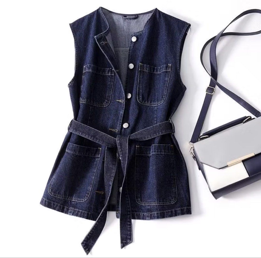 Sleeveless Long Denim Top with Belt (Category: Coats, Jackets and Outerwear) located in Iloilo. Submitted by dabyladaby2 (Listing ID 1465972332, Image 1). Description: Once used Shoulder - 41 cm Chest - 96 cm Length - 67 Bag not included .