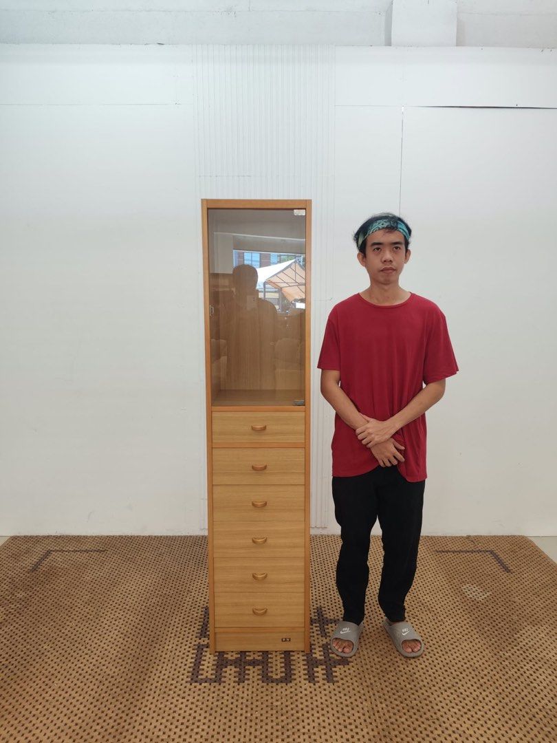 Slim Cabinet (Category: Shelves, Cabinets & Racks) located in Quezon City. Submitted by matetdevis13 (Listing ID 1465994423, Image 1). Description: Shimizu Slim Glass Door Displayer and 6-Tier Drawer Cabinet Price: 3,900 L16 x W16 x H69 In good condition Code MJS16-RB8.