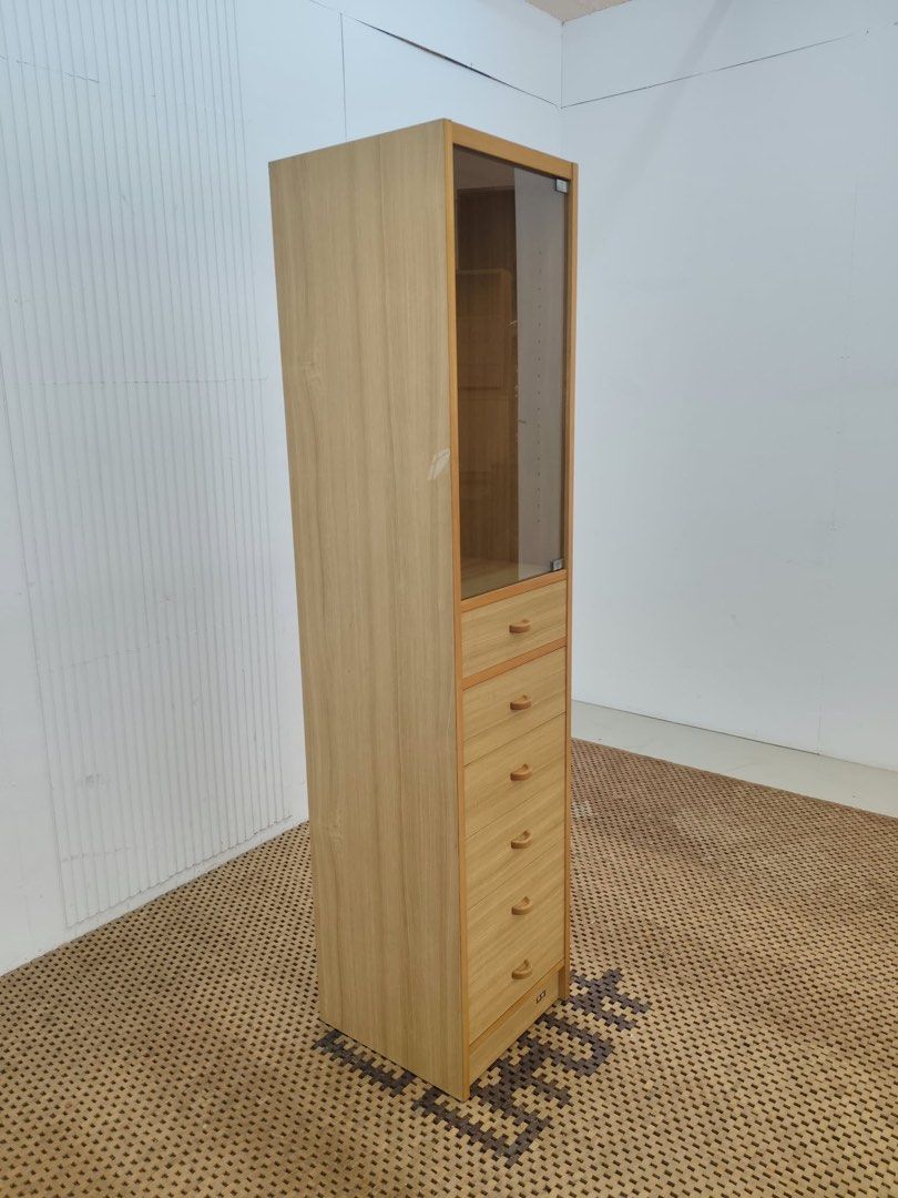 Slim Cabinet (Category: Shelves, Cabinets & Racks) located in Quezon City. Submitted by matetdevis13 (Listing ID 1465994423, Image 2). Description: Shimizu Slim Glass Door Displayer and 6-Tier Drawer Cabinet Price: 3,900 L16 x W16 x H69 In good condition Code MJS16-RB8.