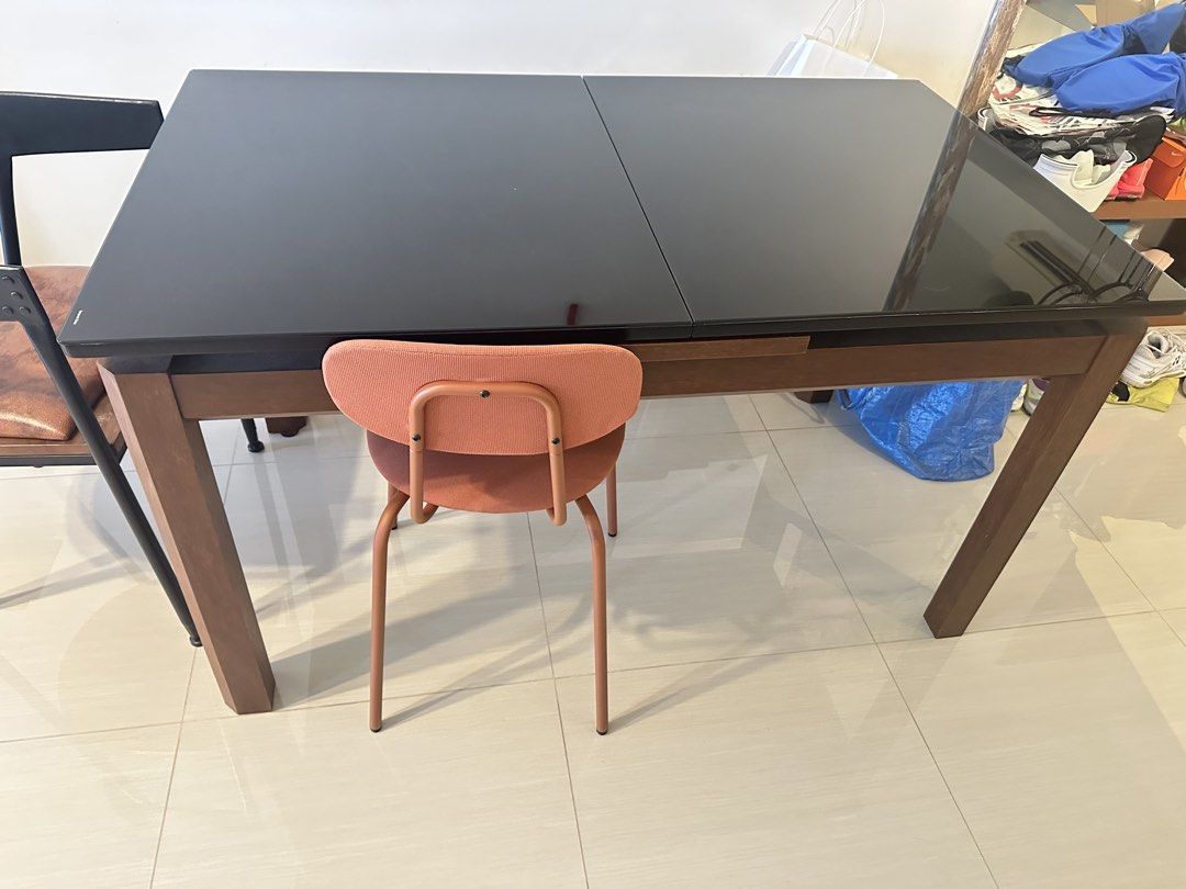 solid wood frame extendable dining table (Category: Tables & Sets) located in Singapore. Submitted by marchfishes (Listing ID 1466064201, Image 2). Description: - 135cm extendable up to 165cm - Sturdy wooden frame and solid legs - chairs NOT included - Comfortably seats multiple people - Low-maintenance, easy-to-clean surface - Heavy, premium build quality, need 3-4 men to carry, or a large trolley - arrange your own transport and movers - disman