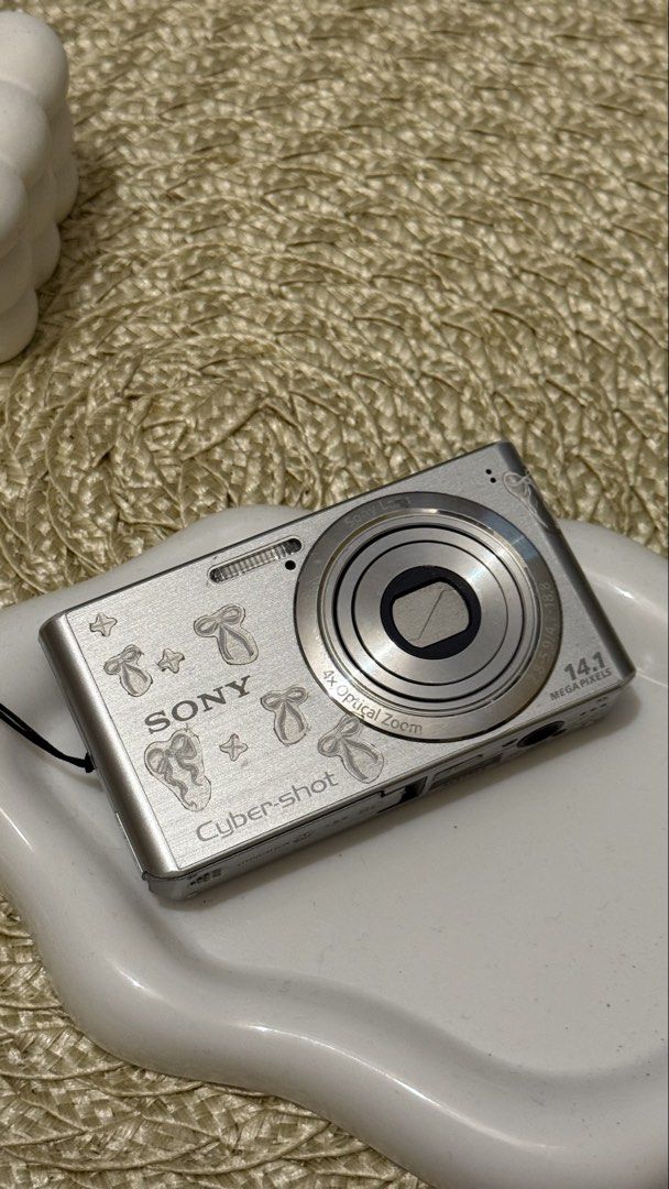 Sony Cyber-shot (14.1 megapixels) (Category: Cameras) located in Manila. Submitted by katsuwina (Listing ID 1466091266, Image 2). Description: 𝘚𝘰𝘯𝘺 𝘊𝘺𝘣𝘦𝘳-𝘴𝘩𝘰𝘵 — bought it last february (8-month old) — free clip charger, with charm attached, no SD card included, with pouch included — RFS: used only between feb to april (nagkaroon ng new cam, so di na nagagamit.) — issue: minimal dents (does not affect the outcome of photos), a little 