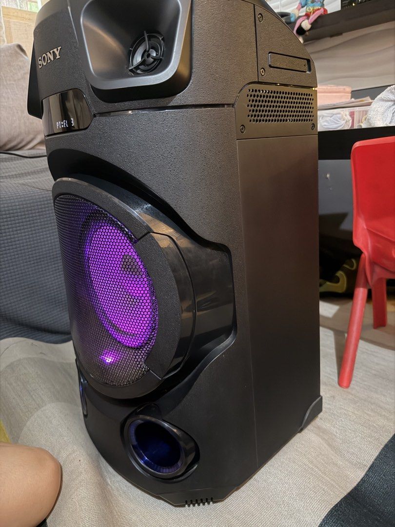 Sony MHC-V13 High Power Audio System (Category: Soundbars, Speakers & Amplifiers) located in Paranaque City. Submitted by ledzai (Listing ID 1465993200, Image 2). Description: - Model: Sony MHC-V13 Home Audio System (Black) - Sound: Powerful audio with vibrant purple speaker lighting and blue accent lights - Features: Top control panel, built-in CD player slot, and Bluetooth connectivity - Entertainment: Dual microphone and guitar inputs, perfect