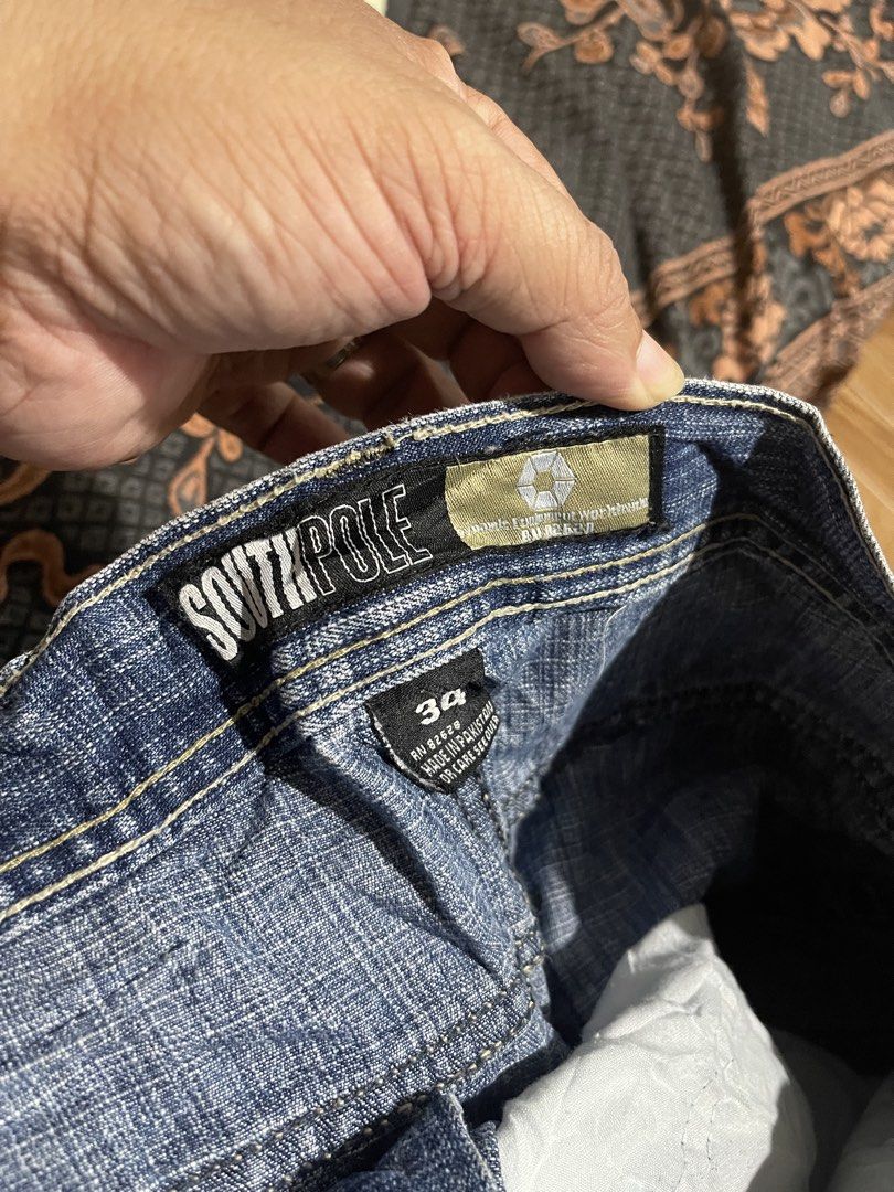 Southpole Denim Shorts Size 34 (Category: Shorts) located in Mandaluyong City. Submitted by mark2pac (Listing ID 1465953876, Image 3). Description: - Brand: Southpole - Size: 34 - Color: Blue wash - Fit: Classic baggy fit with wide leg opening - Details: Traditional 5-pocket setup, back pocket detailing, and branded patch on waistband - Construction: Heavy-duty stitching - Origin: Made in Pakistan - Style: Y2K streetwear vibe.