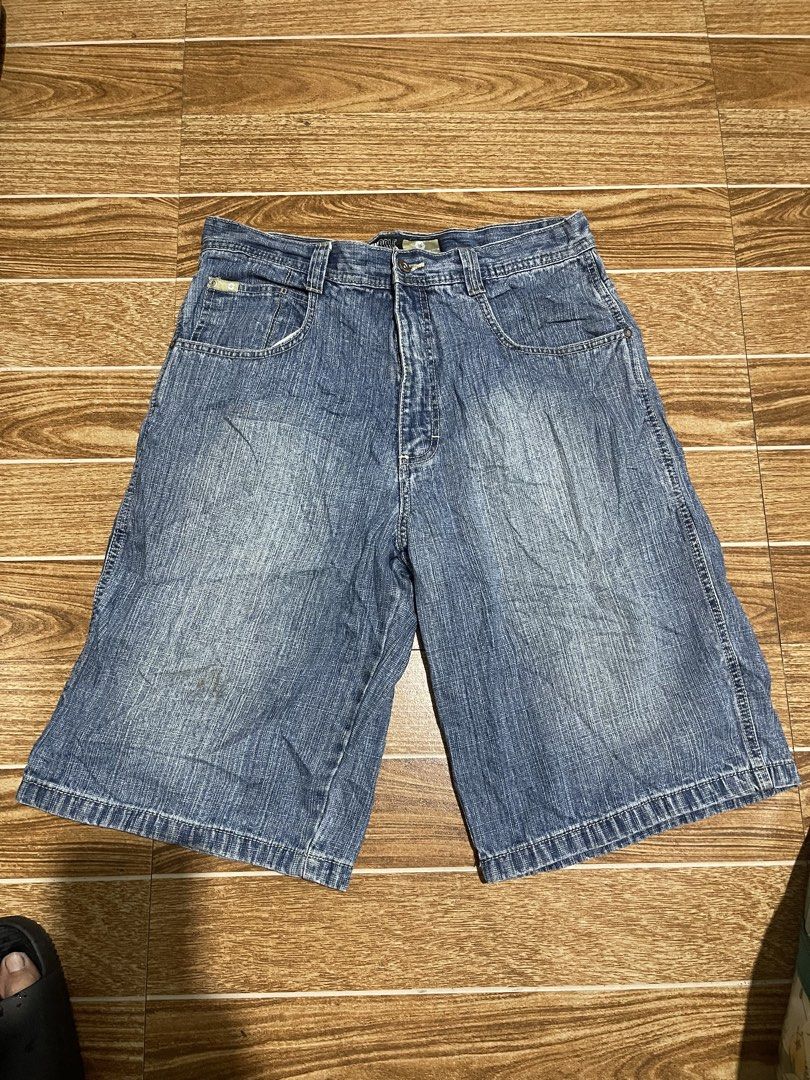 Southpole Denim Shorts Size 34 (Category: Shorts) located in Mandaluyong City. Submitted by mark2pac (Listing ID 1465953876, Image 2). Description: - Brand: Southpole - Size: 34 - Color: Blue wash - Fit: Classic baggy fit with wide leg opening - Details: Traditional 5-pocket setup, back pocket detailing, and branded patch on waistband - Construction: Heavy-duty stitching - Origin: Made in Pakistan - Style: Y2K streetwear vibe.