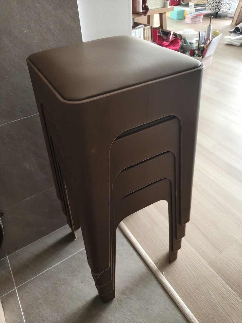 Stackable Brown Stools Set (Category: Chairs) located in Singapore. Submitted by lia.abdullah (Listing ID 1466048013, Image 2). Description: Set of (4) brown stackable stools • Comfortable cushioned top seats • Space-saving design that easily tucks away • Sturdy construction for daily use • Ideal for small apartments or extra seating • Clean condition overall. Had them for about 2 months. Rarely used. .
