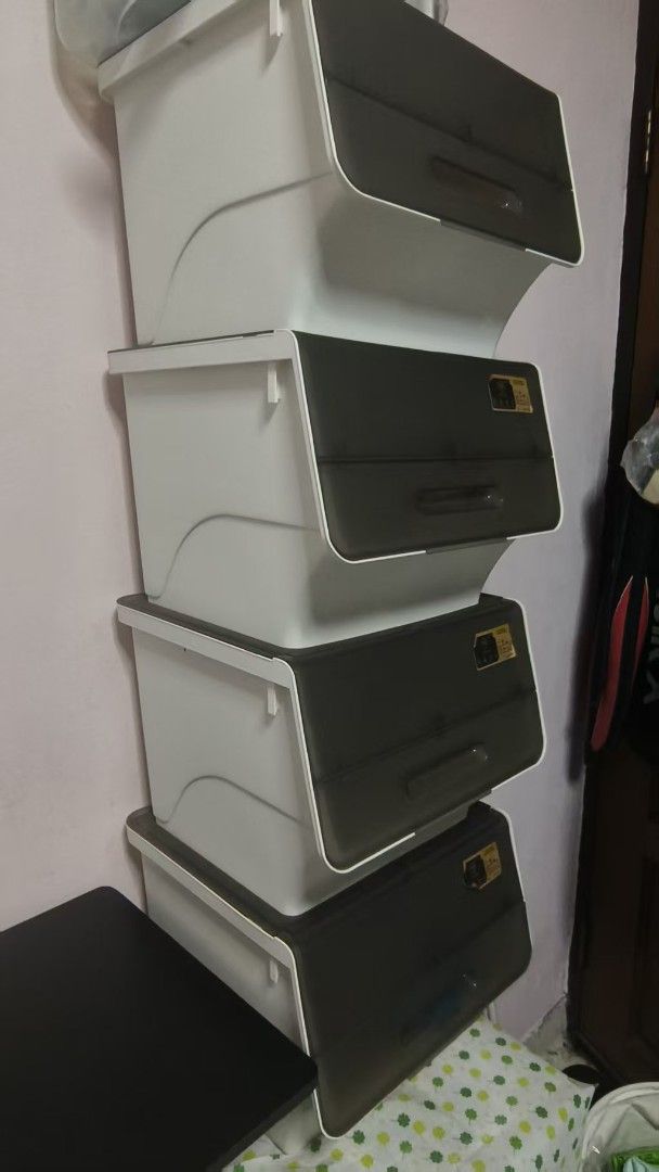 Stackable storage boxes (Category: Storage Boxes & Baskets) located in Singapore. Submitted by xixiner (Listing ID 1466030745, Image 2). Description: - Set of 4 stackable storage boxes - drop-front doors - Convenient pull handles on each door - Ideal for organizing clothes, snacks and household items Selling in set of 4 $30 Self pick up at telok blangah drive.