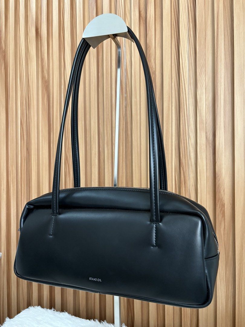 STAND OIL SHOULDER BAG IN BLACK (Category: Shoulder Bags) located in Imus. Submitted by dumpitlikeaqueen (Listing ID 1465967739, Image 3). Description: • From Singapore • With dust bag • Open for layaway • Instagram Shop: @dumpitlikeaqueen.