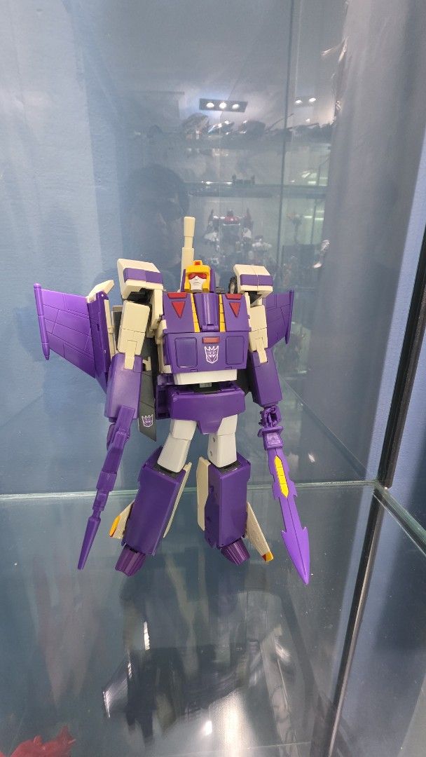 Startoys Transformers Blitzwing (Category: Action & Battle Toys) located in Quezon City. Submitted by danteborja2 (Listing ID 1465994219, Image 2). Description: - Item: Startoys Decepticon Blitzwing Action Figure (Classic G1 Style) - Included Accessories: Purple sword and blaster; comes with box - Condition: Displayed in a glass shelf, vibrant colors, and clean joints - Perfect for: Transformers collectors and fans.