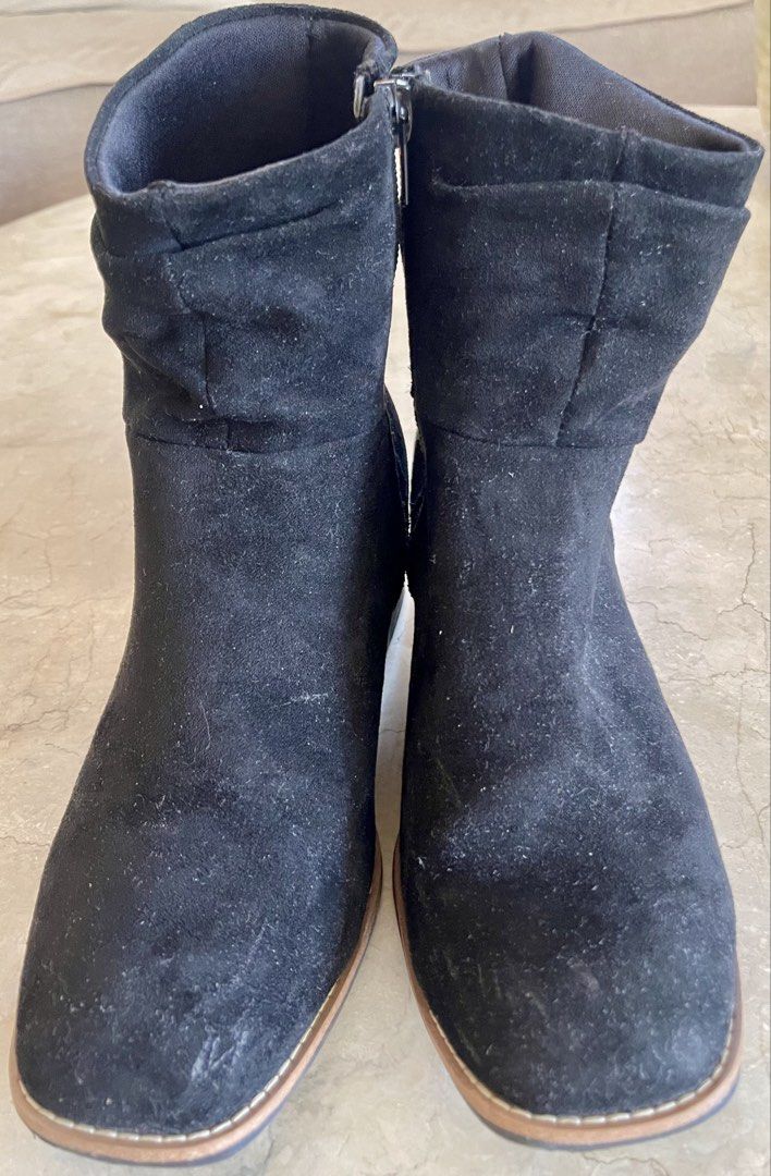 Steve Madden Boots (Category: Boots) located in San Juan City. Submitted by rike_ramirez (Listing ID 1465961319, Image 1). Description: Original and authentic, purchased in the USA Steve Madden LLVISA Boots - Size: 5 - Color: Black - Design: Slouchy shaft style with square toes - Closure: Convenient side zipper - Heel: Wood-grain finish block heel - Material: Textile upper and lining - Condition: Worn a few times, with light wear on the soles.