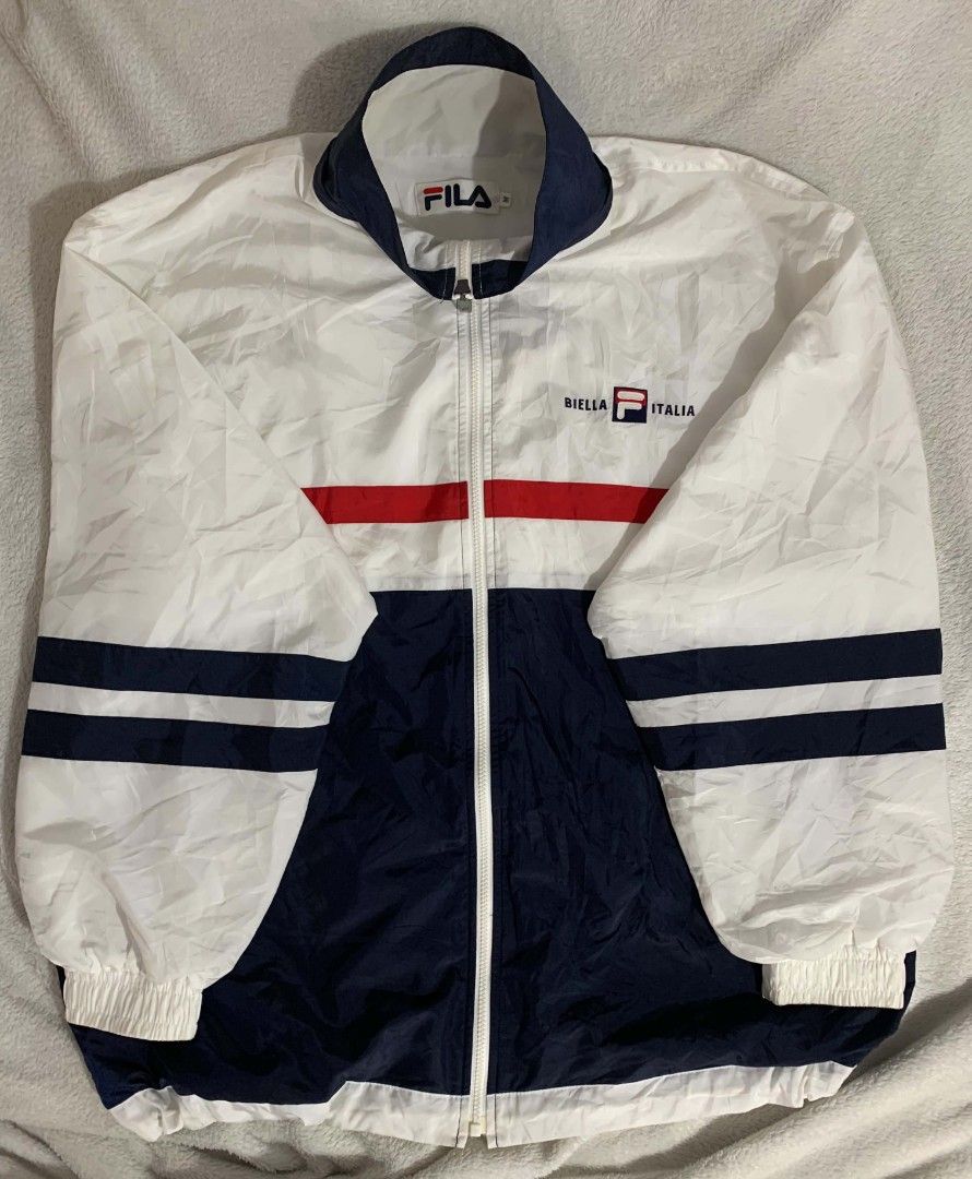 Steve Vincent (Category: Coats, Jackets and Outerwear) located in Roxas, Palawan. Submitted by tevetindahanph (Listing ID 1466035415, Image 1). Description: Vintage 90s FILA running jacket with OG FILA signature color which is white,blue and red.Fila logo at left chest.Condition was pretty great without any damage only need Wash.The zipper also in great condition not stuck on it. .