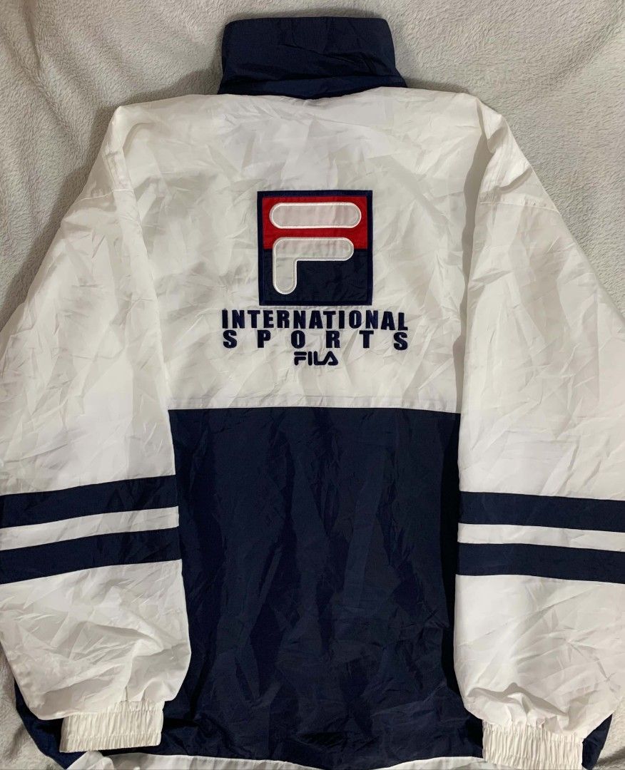 Steve Vincent (Category: Coats, Jackets and Outerwear) located in Roxas, Palawan. Submitted by tevetindahanph (Listing ID 1466035415, Image 2). Description: Vintage 90s FILA running jacket with OG FILA signature color which is white,blue and red.Fila logo at left chest.Condition was pretty great without any damage only need Wash.The zipper also in great condition not stuck on it. .