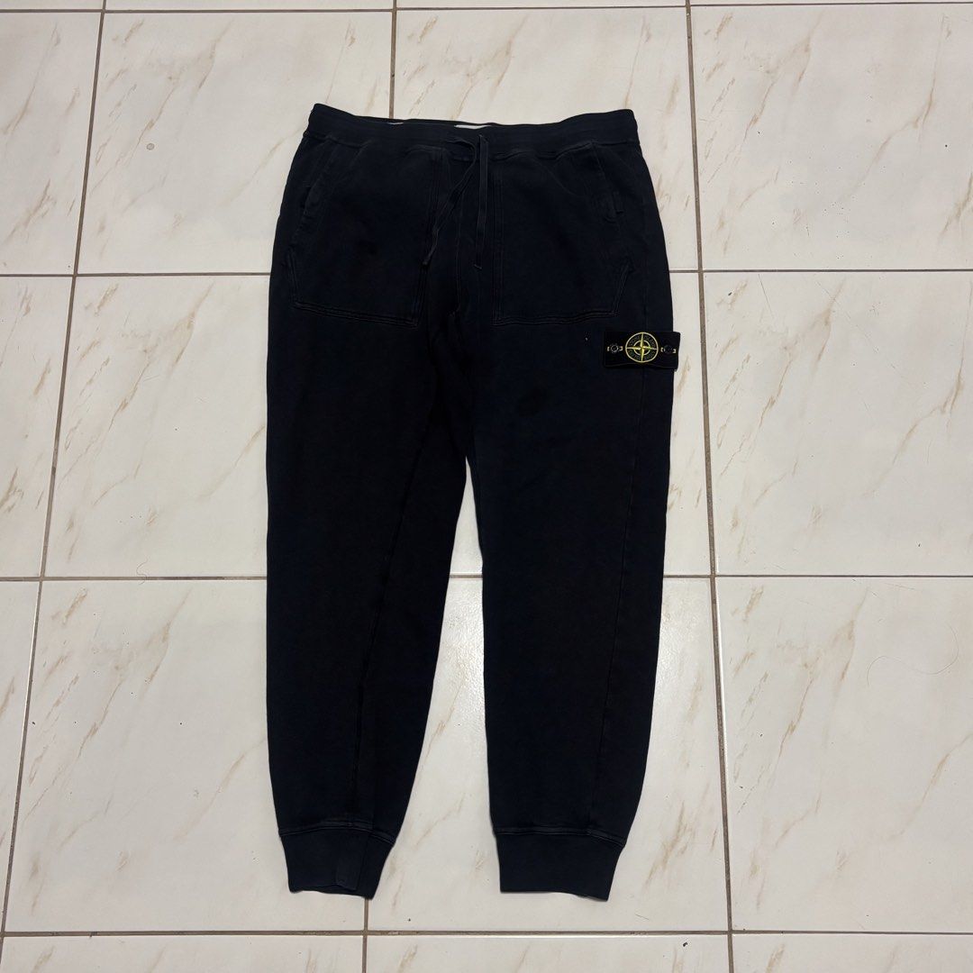 Stone island jogger pants (Category: Joggers) located in San Fernando. Submitted by diff.thr1ft (Listing ID 1466093928, Image 1). Description: - Brand: Stone Island - Item: Jogger pants - Color: Black - Size: Large (L) - Material: Comfortable cotton fleece - Features: Signature Stone Island side patch, adjustable drawstring waistband, pockets - Authenticity: Includes Certilogo tag for verification - Condition: Good pre-loved condition.