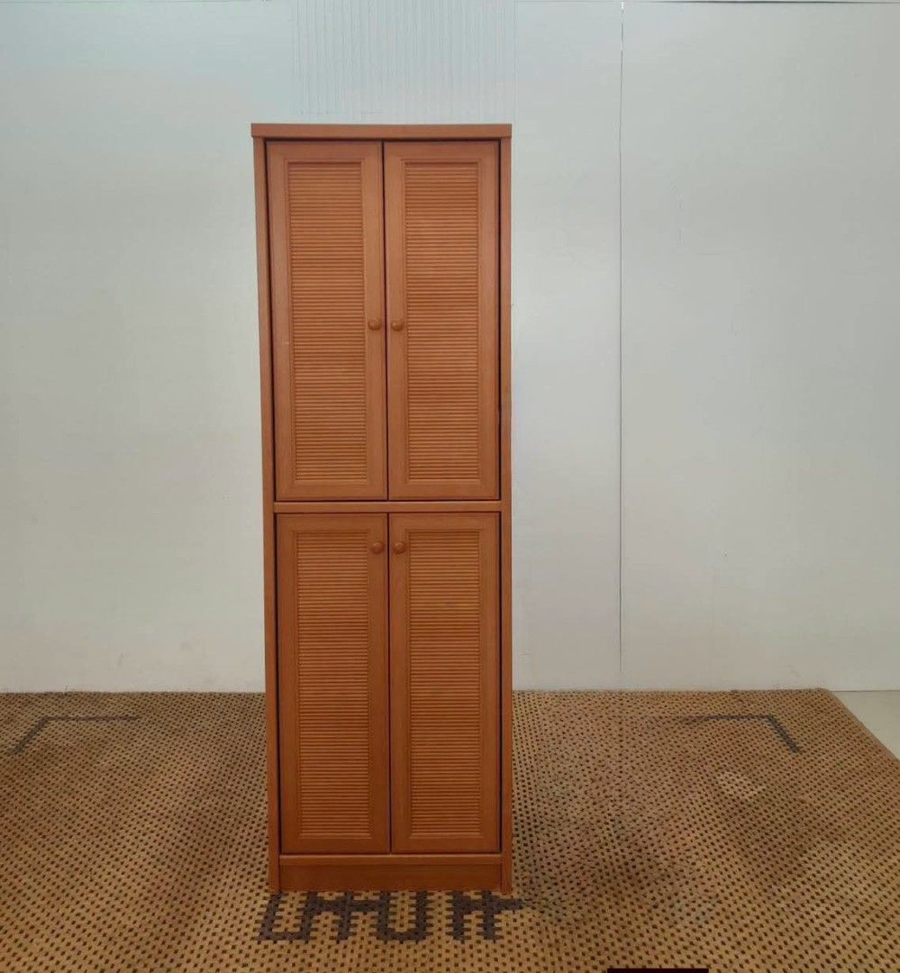 Storage Cabinet (Category: Shelves, Cabinets & Racks) located in Meycauayan. Submitted by marygracecasimiro (Listing ID 1466031203, Image 1). Description: Tall Wooden 4-Door Storage Cabinet with Shelves Price: 10,500 Sale:8,500 L23 x W15 x H71.5 In good condition💚/🩷.