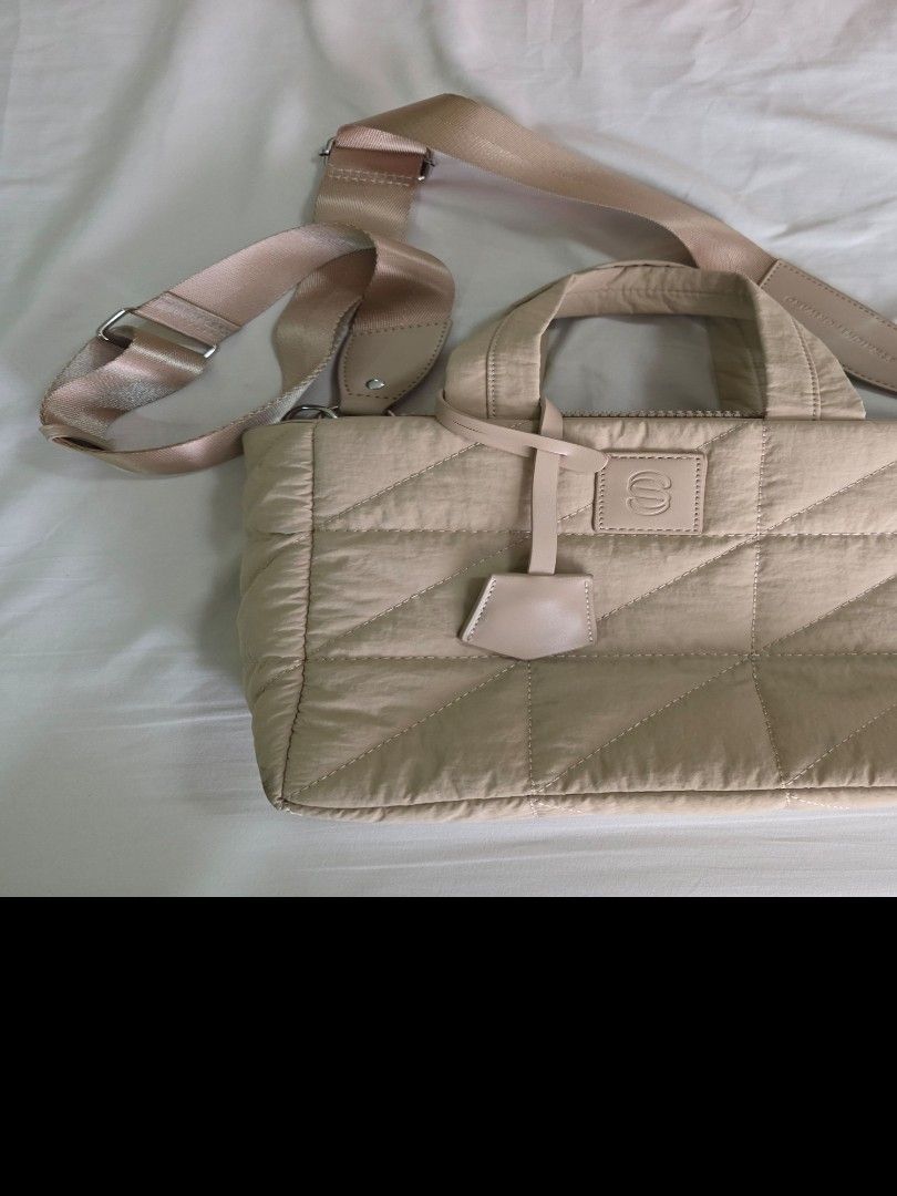 Straightforward Solari Sling Bag (Category: Tote Bags) located in Quezon City. Submitted by jaye.elle (Listing ID 1465966142, Image 1). Description: bag is generally in good condition and looks new. has a small stain (see last photo). all leather parts are still intact and silver accessories are shiny. RFS: Decluttering MOP: Maya/Gcash Shipping at buyer's expense.