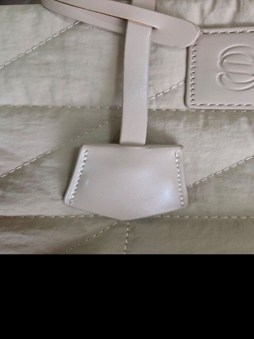 Straightforward Solari Sling Bag (Category: Tote Bags) located in Quezon City. Submitted by jaye.elle (Listing ID 1465966142, Image 3). Description: bag is generally in good condition and looks new. has a small stain (see last photo). all leather parts are still intact and silver accessories are shiny. RFS: Decluttering MOP: Maya/Gcash Shipping at buyer's expense.