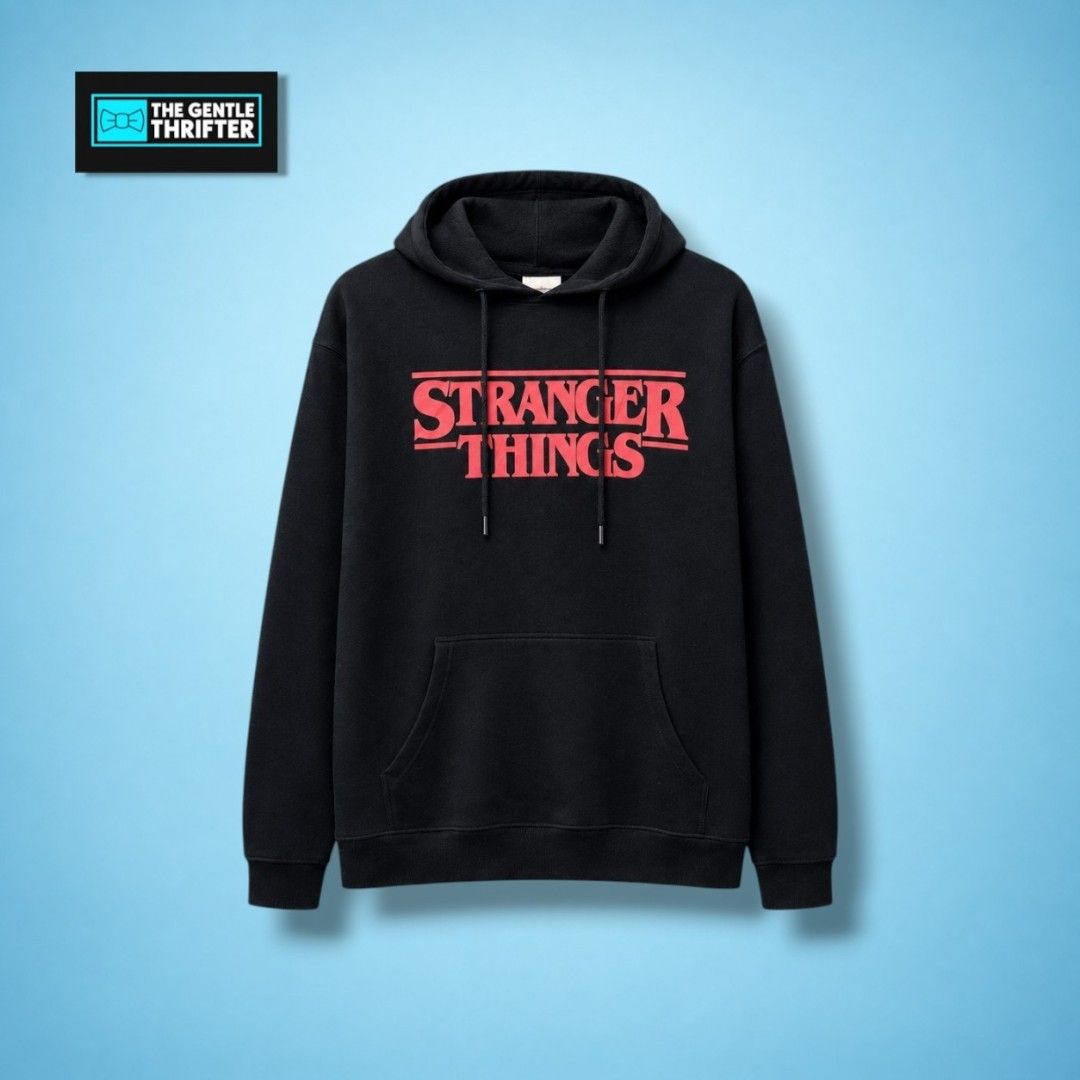 Stranger Things Mid Script Black Hoodie (Category: Coats, Jackets and Outerwear) located in Quezon City. Submitted by thegentlethrifter_1.0 (Listing ID 1466151295, Image 1). Description: Color Rate: 9.9/10 (Deadstock Condition) Size on Tag: M (Mens) Fit to: M to Semi-L (Mens) L to Semi-XL (Womens) Price: Php 400 + Shipping Dimes: 29 inches (Length) 22.5 inches (Width) Issue: Needs Hand Wash (Not yet washed because the hang tag is still attached) 