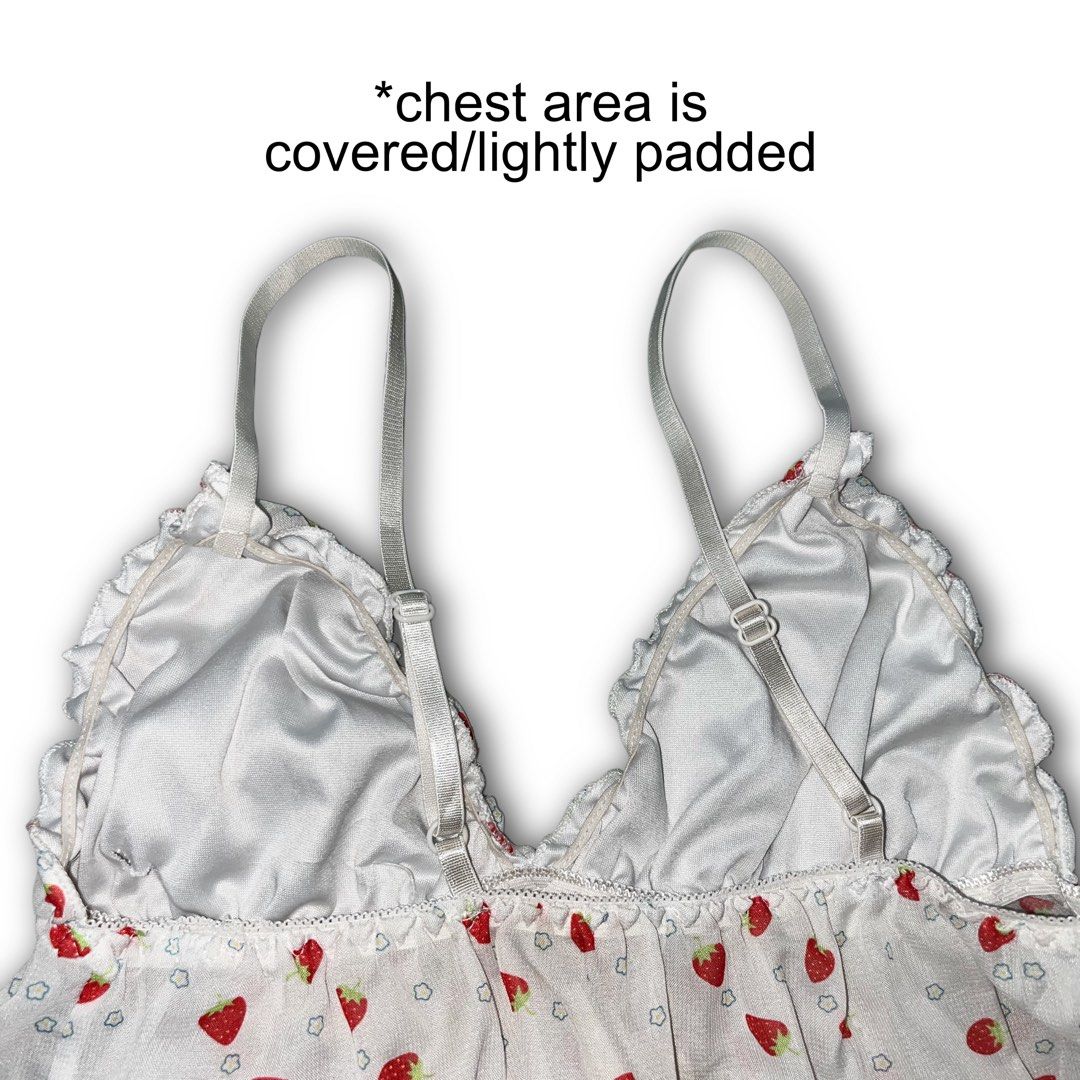 Strawberry Print Sheer Camisole/Cami Top with Light Padding (Category: Sleeveless) located in Liliw. Submitted by virgbaby0 (Listing ID 1466025403, Image 3). Description: super cute coquette / y2k strawberry print cami top 🍓✨ gives major soft girl ! *bottom half is lightweight see-through chiffon fabric, chest area is lined / lightly padded with adjustable straps so it’s super easy to wear - Design: White camisole with red strawberry prints and 