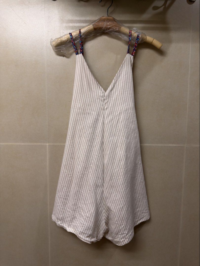 Striped Sleeveless Romper (Category: Dresses) located in Manila. Submitted by benzey (Listing ID 1465976554, Image 1). Description: Preloved and still in good condition. 🤍 Color: Beige/White stripes Style: Sleeveless romper / playsuit Fit: Relaxed and comfortable.