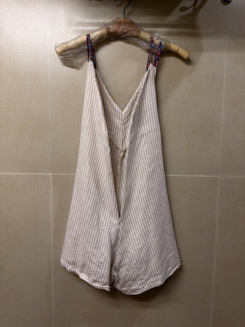 Striped Sleeveless Romper (Category: Dresses) located in Manila. Submitted by benzey (Listing ID 1465976554, Image 2). Description: Preloved and still in good condition. 🤍 Color: Beige/White stripes Style: Sleeveless romper / playsuit Fit: Relaxed and comfortable.