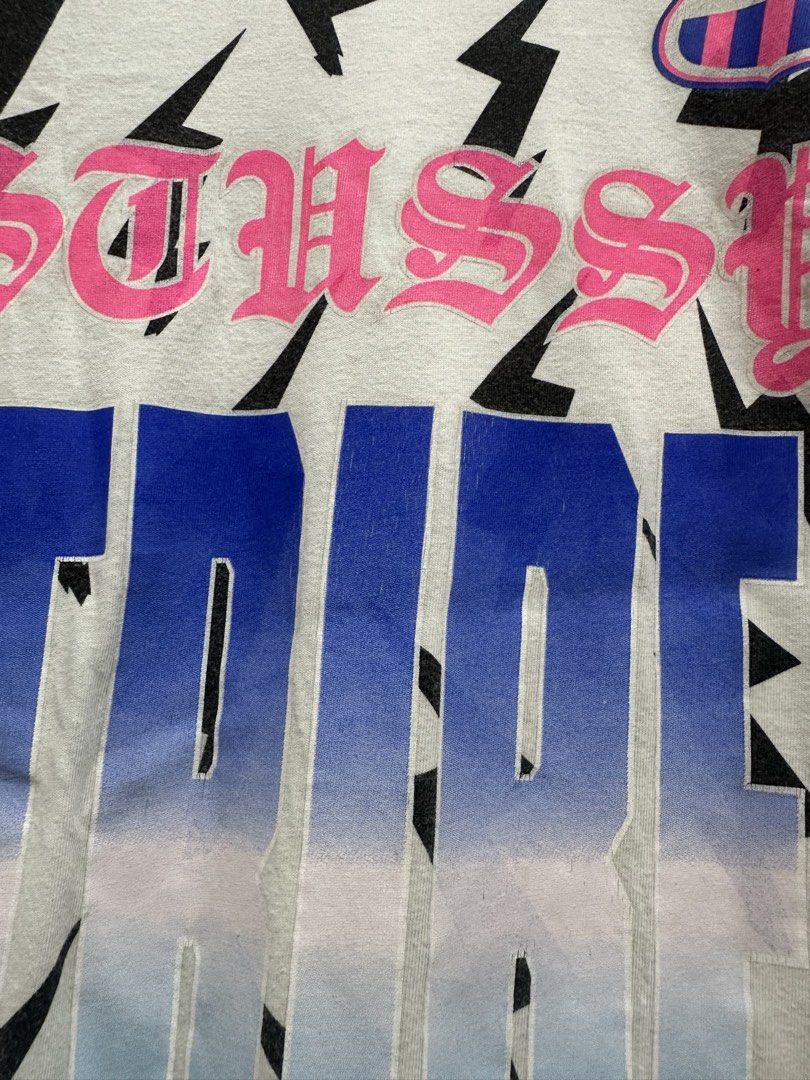 Stüssy Tribe #8 Lightning Bolts AOP Tee (Authentic) (Category: Tshirts & Polo Shirts ) located in Manila. Submitted by ylsrarities (Listing ID 1465992887, Image 3). Description: • Size M • Measurements: 19Width x 29Length • 100% Cotton • Made in Mexico • Stüssy Tribe #8 design • All over lightning bolt print • Large “8” graphic on back • Pink Stüssy branding • Short sleeve crewneck Condition: 8.7/10 Pre owned with visible signs of age and wear. S