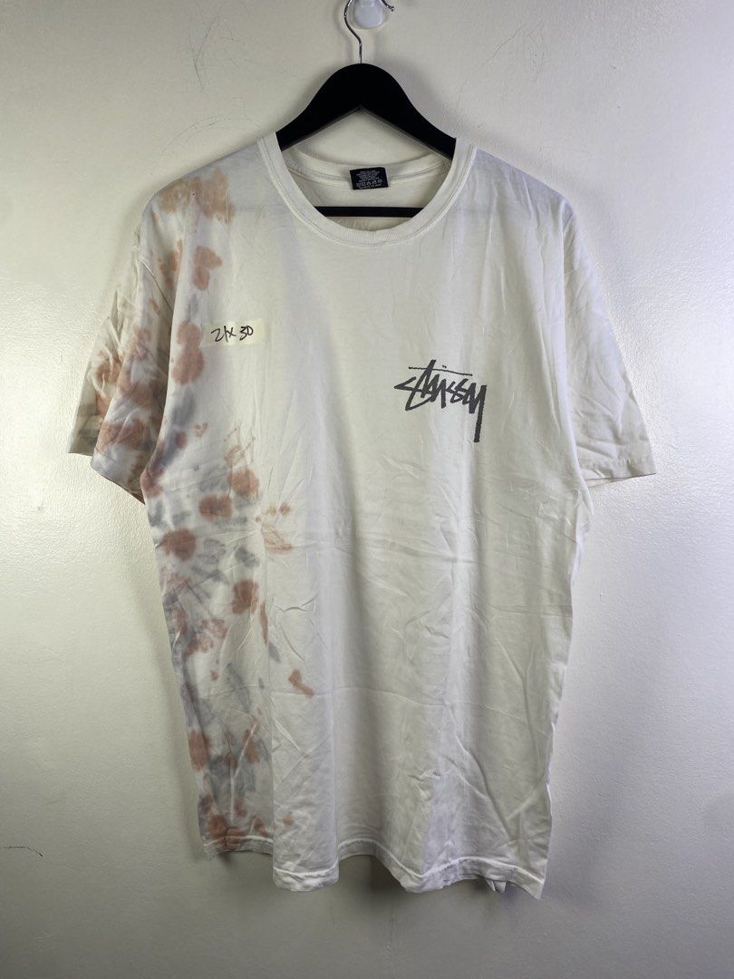 Stussy Split Dye T-shirt White Large (Category: Tshirts & Polo Shirts ) located in Manila. Submitted by declutterpromax (Listing ID 1466000801, Image 1). Description: - Brand: Stussy - Style: Crew neck short sleeve t-shirt with a unique brown/grey split tie-dye on the right side and sleeve - Size: Large - Details: Signature Stussy logo on left chest - Material: 100% cotton, Made in Mexico - Condition: Brand new with tag attached - Perfect for eff