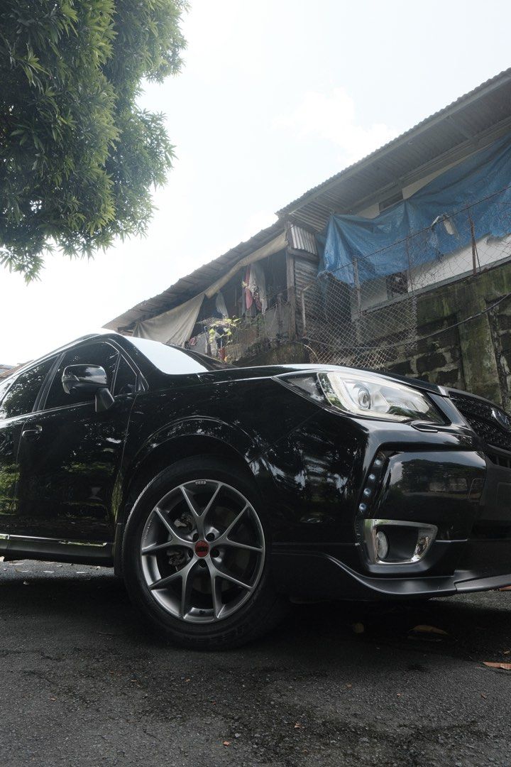 Subaru Forester 2.0 XT (A) (Category: Used Cars) located in Manila. Submitted by inflvenceph (Listing ID 1465997065, Image 2). Description: 2019 Subaru Forester XT Sport (LIMITED) (Less than 10 units & around 1 per color) 30k+ orig mileage (Maintained by Moducare) Ending #4 (Tues coding) Crystal Black Silica Color 2.0 Turbo Boxer Engine 250hp Stock engine Automatic AWD Very fresh interior* SPORT VARIANT UPGRADES + MORE OEM Front Under Spoiler (40