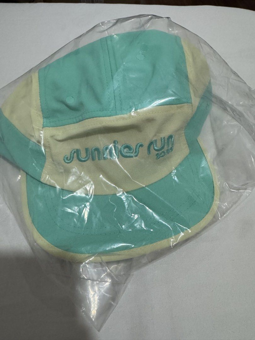 Sunnies Run 2026 Cap (Category: Hats & Beanies) located in Malabon City. Submitted by marflores (Listing ID 1465960820, Image 1). Description: - Event: Sunnies Run 2026 - Color: Mint green and yellow - Condition: Brand new, unopened in original plastic wrapper - Design: Classic six-panel construction with curved brim and embroidered front text - Perfect for collectors and fans of the event.