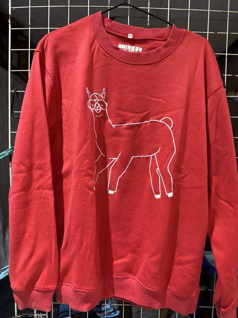 Sunnies Studios Red Llama Graphic Sweatshirt Size 2 (Category: Longsleeves) located in Quezon City. Submitted by nsseller (Listing ID 1466097023, Image 1). Description: - Brand: Sunnies Studios - Color: Red with white outline llama in glasses graphic - Size: Tag 2 (Can fit up to M) - Material: Soft fleece lining inside for extra warmth - Details: Crew neck, long sleeves, ribbed cuffs and hem - Condition: Clean and ready to wear.
