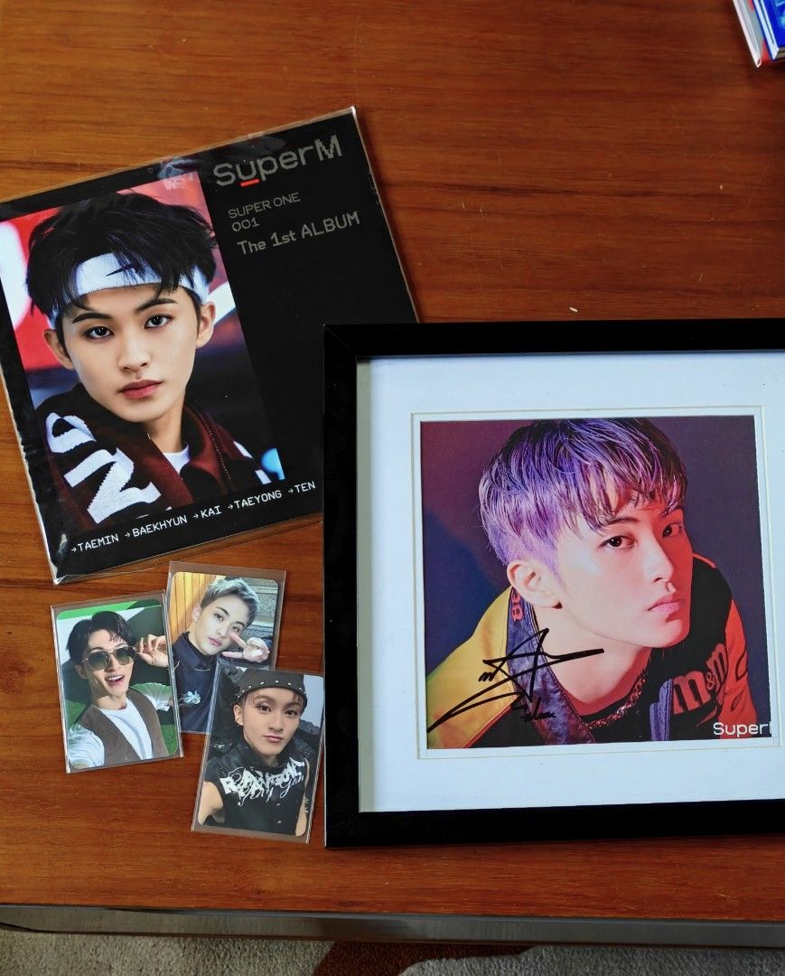 Super M Mark Lee Signed Lithographs with Photocards Bundle (Category: K-Wave Merchandise) located in Quezon City. Submitted by secondninico (Listing ID 1466042378, Image 1). Description: Selling my SuperM/Mark collection as a bundle. Includes the SuperM 1st Album, framed Mark photo with signature, plus the 3 photocards shown in the photos. Everything has been kept in my collection and is being sold as pictured. Includes: SuperM 1st Album Framed M