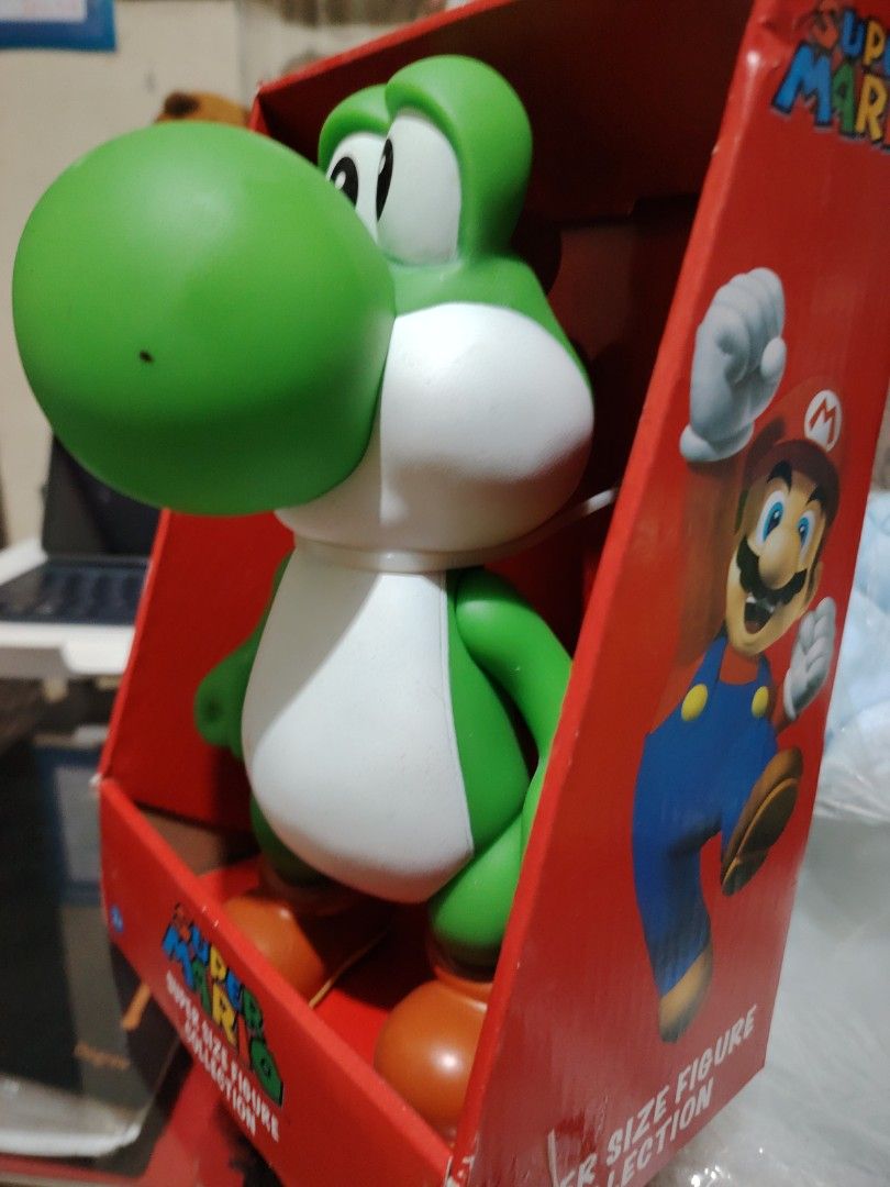 Super Mario Super Size Figure Collection Yoshi (Category: Figurines & Statues) located in Manila. Submitted by justybelieve2026 (Listing ID 1466093107, Image 2). Description: - Authentic 2009 Nintendo official merchandise by Banpresto - Part of the highly collectible Super Size Figure Collection -9 inches - Features Yoshi in his original red cardboard display box with iconic Mario and Luigi graphics - Figure remains securely sealed and untouched 
