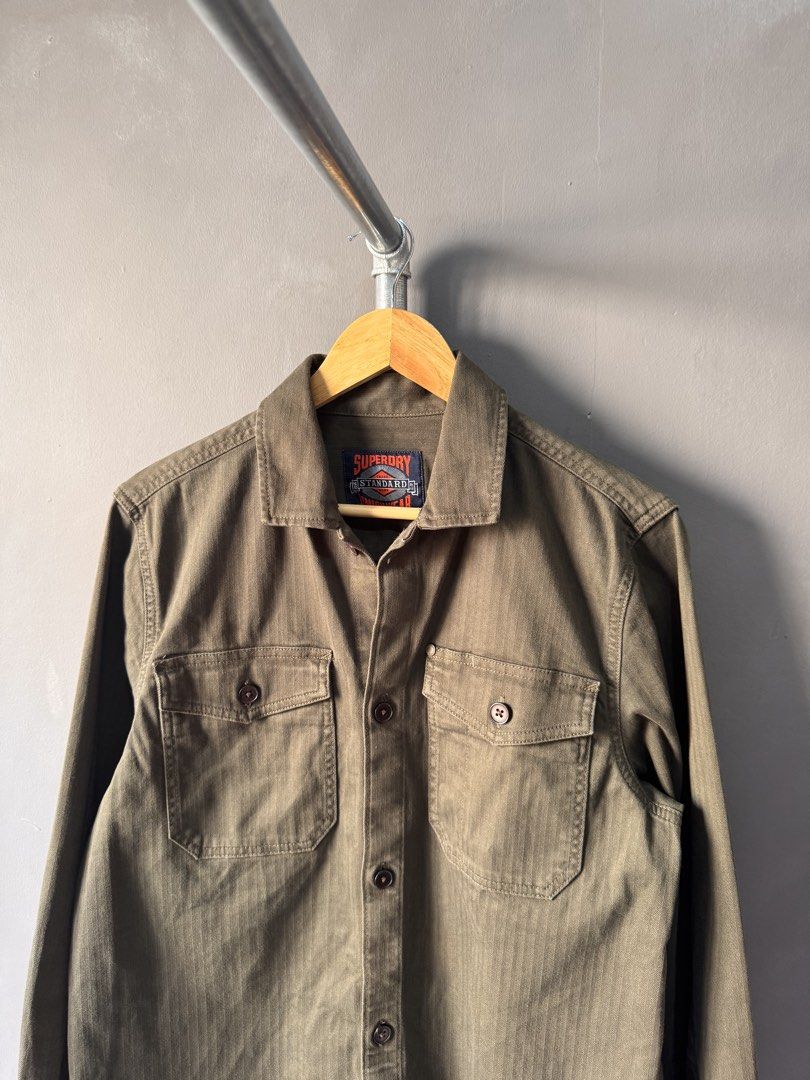 Superdry - Union Wear Olive Herringbone Work shirt (Category: Activewear) located in Cabuyao City. Submitted by _streetflavor (Listing ID 1465989127, Image 2). Description: Superdry - Union Wear Olive Herringbone Work shirt Excellent Size: medium Length: 27 Width: 21.5 -1,580 pesos Dm.