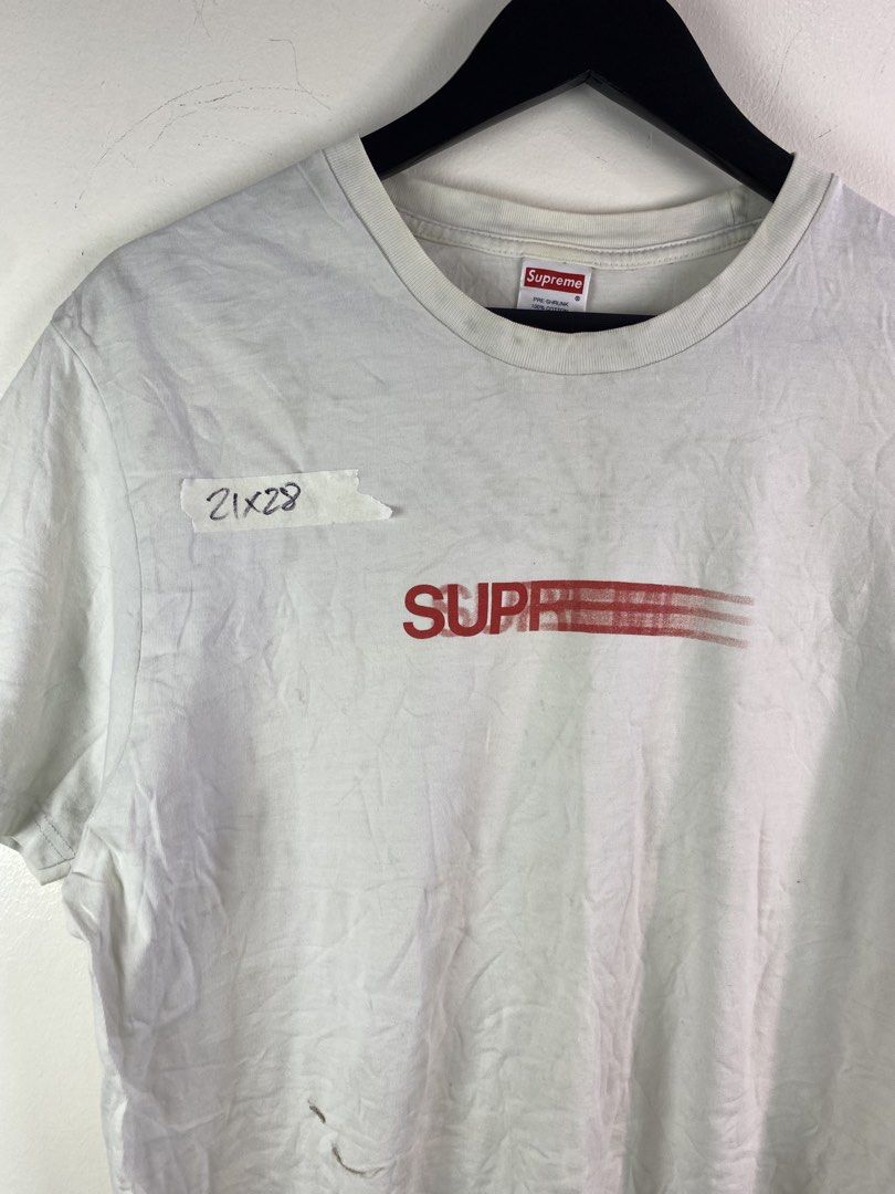 Supreme Motion Logo Tee White Size L (Category: Tshirts & Polo Shirts ) located in Manila. Submitted by declutterpromax (Listing ID 1466027554, Image 3). Description: - Brand: Supreme - Style: Motion Logo Tee - Color: White - Size: Large (approx. 21" pit to pit x 28" length) - Material: 100% pre-shrunk cotton, Made in USA - Details: Classic red motion logo on chest, box logo collar tag - Condition: Pre-owned with visible wear and staining near th