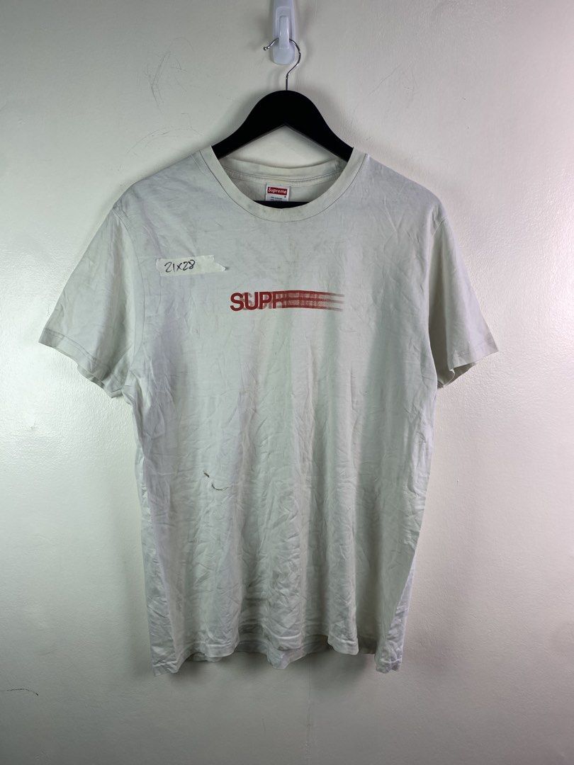 Supreme Motion Logo Tee White Size L (Category: Tshirts & Polo Shirts ) located in Manila. Submitted by declutterpromax (Listing ID 1466027554, Image 1). Description: - Brand: Supreme - Style: Motion Logo Tee - Color: White - Size: Large (approx. 21" pit to pit x 28" length) - Material: 100% pre-shrunk cotton, Made in USA - Details: Classic red motion logo on chest, box logo collar tag - Condition: Pre-owned with visible wear and staining near th