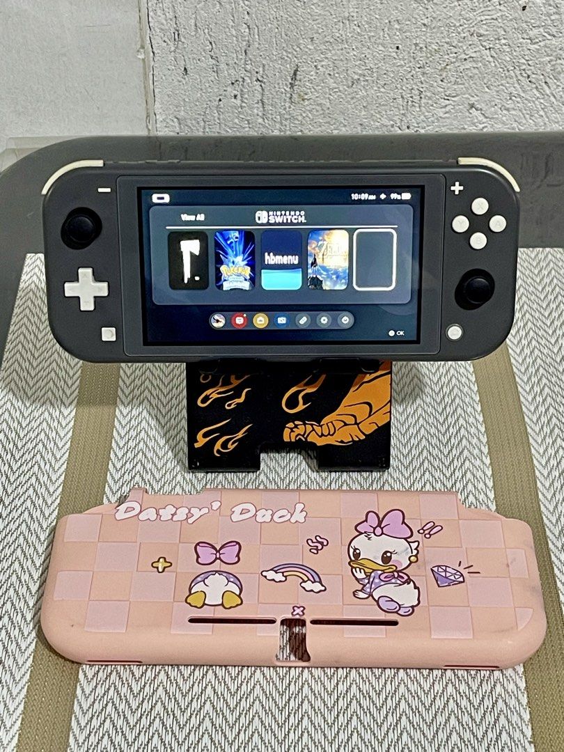 Switch Lite Jailbreak with case (Category: Nintendo) located in Bacoor. Submitted by icarusjinzakk (Listing ID 1465966842, Image 1). Description: Nintendo Switch Lite Jailbreak (modchip) Sandisk Extreme Pro 64gb Hall Effect Joystick Very fast loading speed and installation speed Game of your choice pili ka install ko Issue: ghost touch touchscreen (inalis ko connection) di ko na pinalitan makinis pa naman at di naman gaano gamit ang touchscreen U